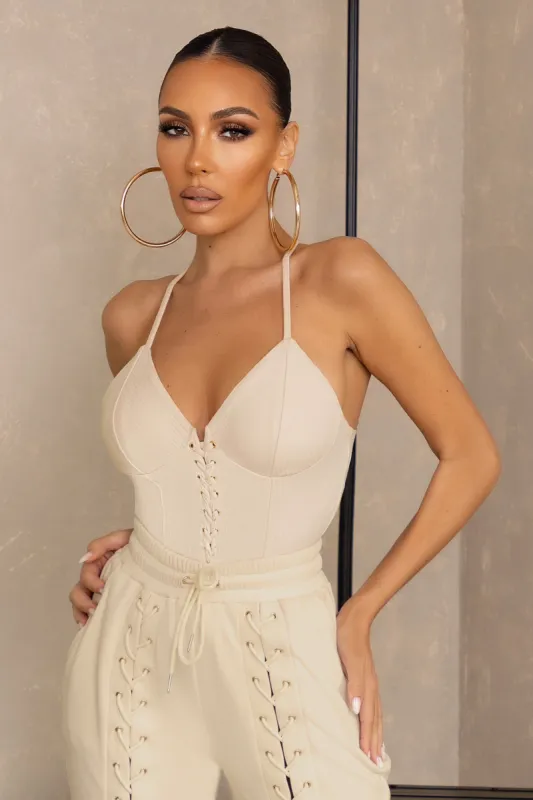 Cross My Heart | Cream Eyelet and Lace-Up Detail Rib Corset Top sold by Club L London