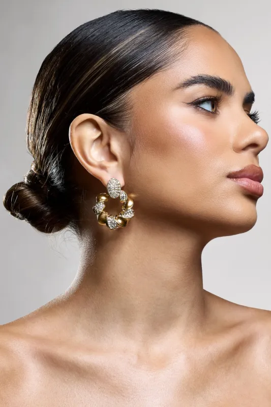 Thelma | Gold Diamante Twisted Drop Earrings sold by Club L London