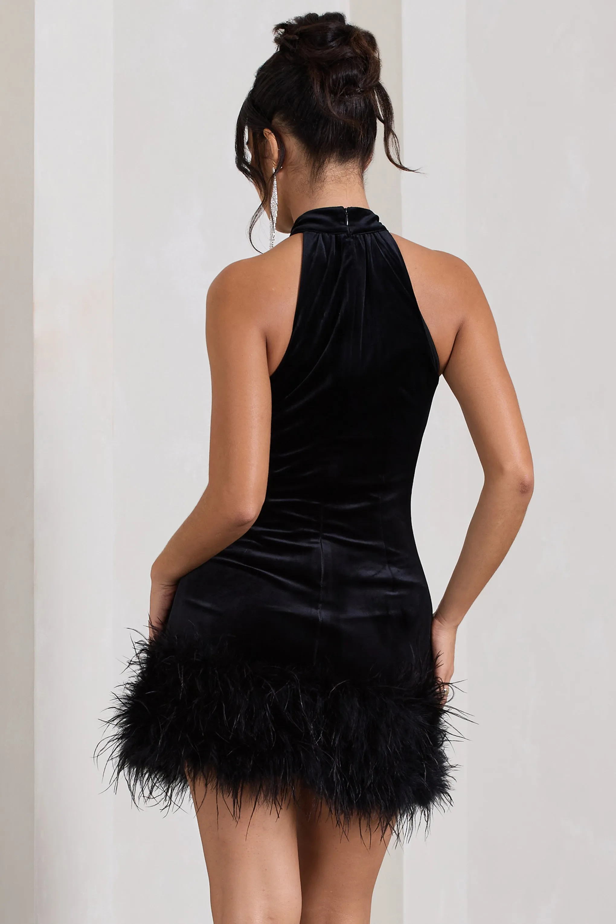Tillie | Black Velvet High Neck Trapeze Mini Dress With Feather Hem Detail sold by Club L London product image thumbnail 2