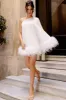 Epiphany | White One Shoulder Cape Sleeve Mini Dress With Feathers sold by Club L London