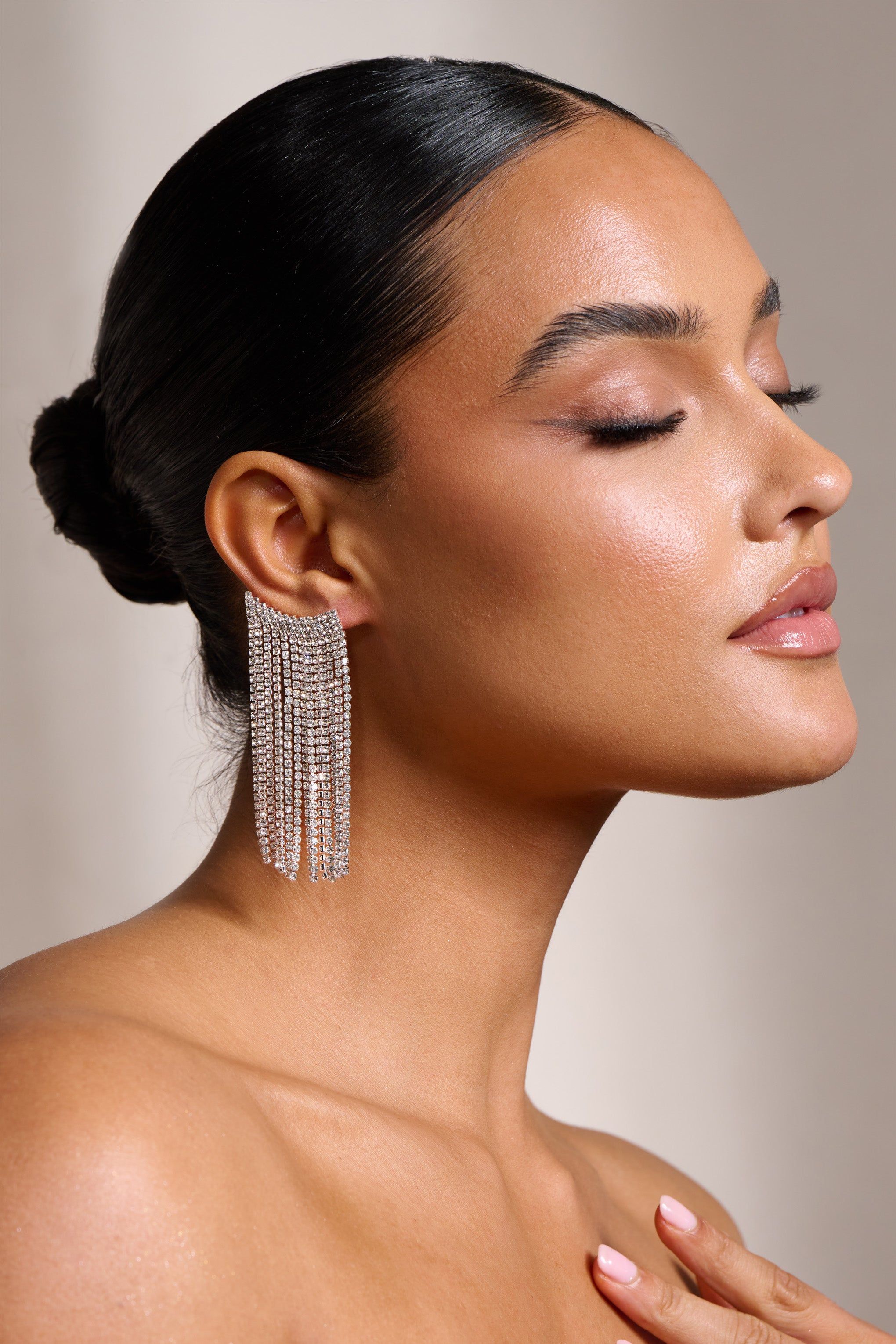 Petal | Silver Diamante Tassel Cuff Earrings sold by Club L London