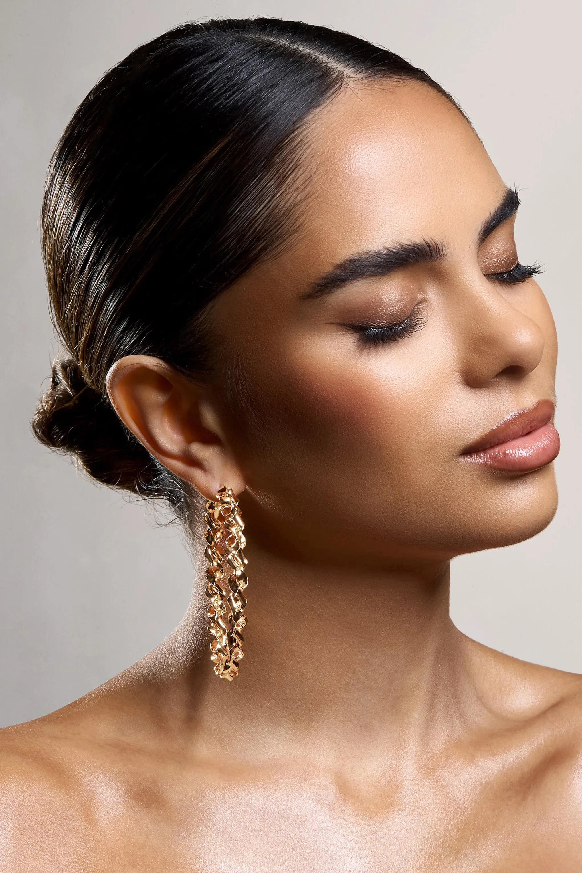 Cecilia | Gold Twisted Hoop Earrings sold by Club L London product image thumbnail 2