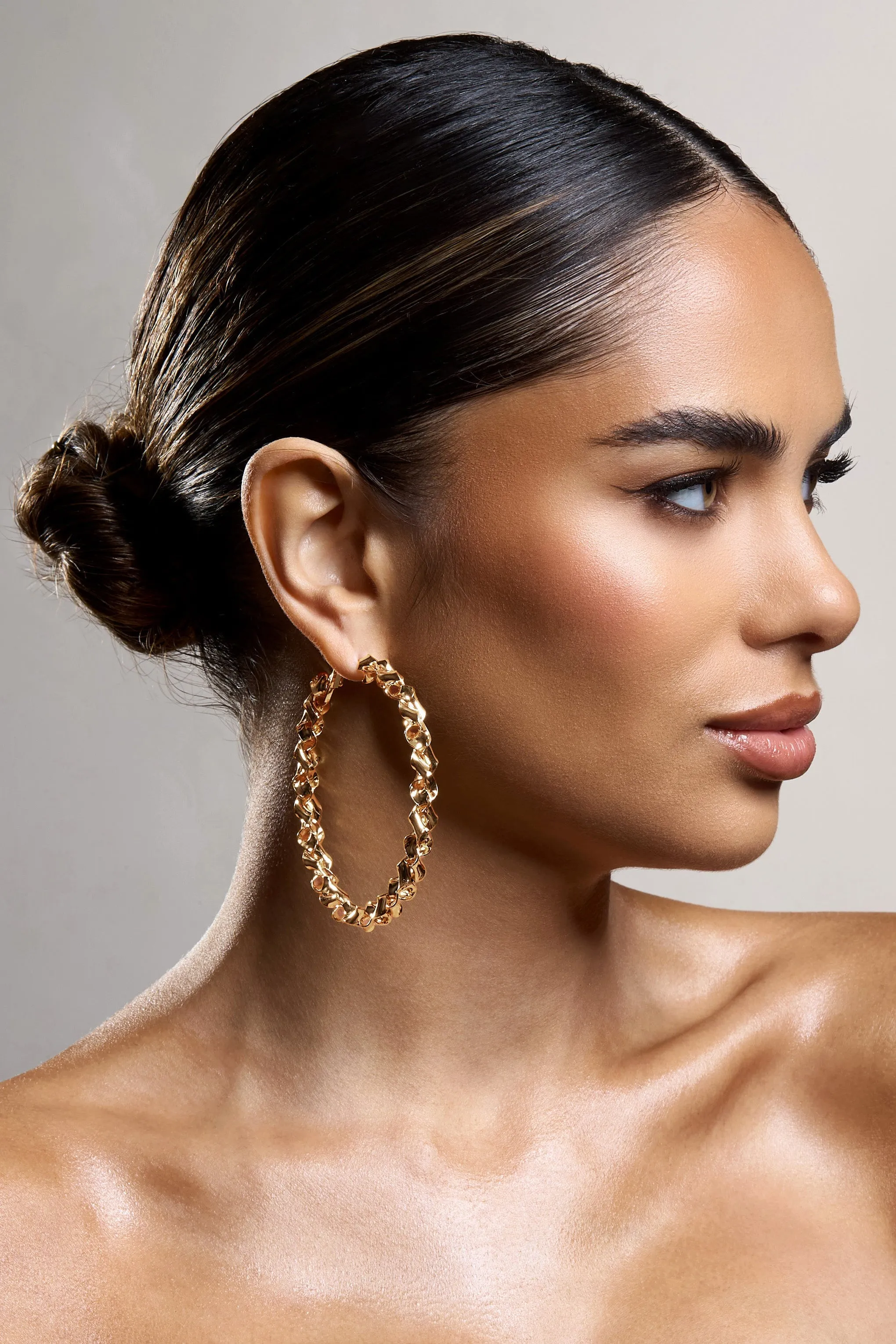 Cecilia | Gold Twisted Hoop Earrings sold by Club L London product image thumbnail 3