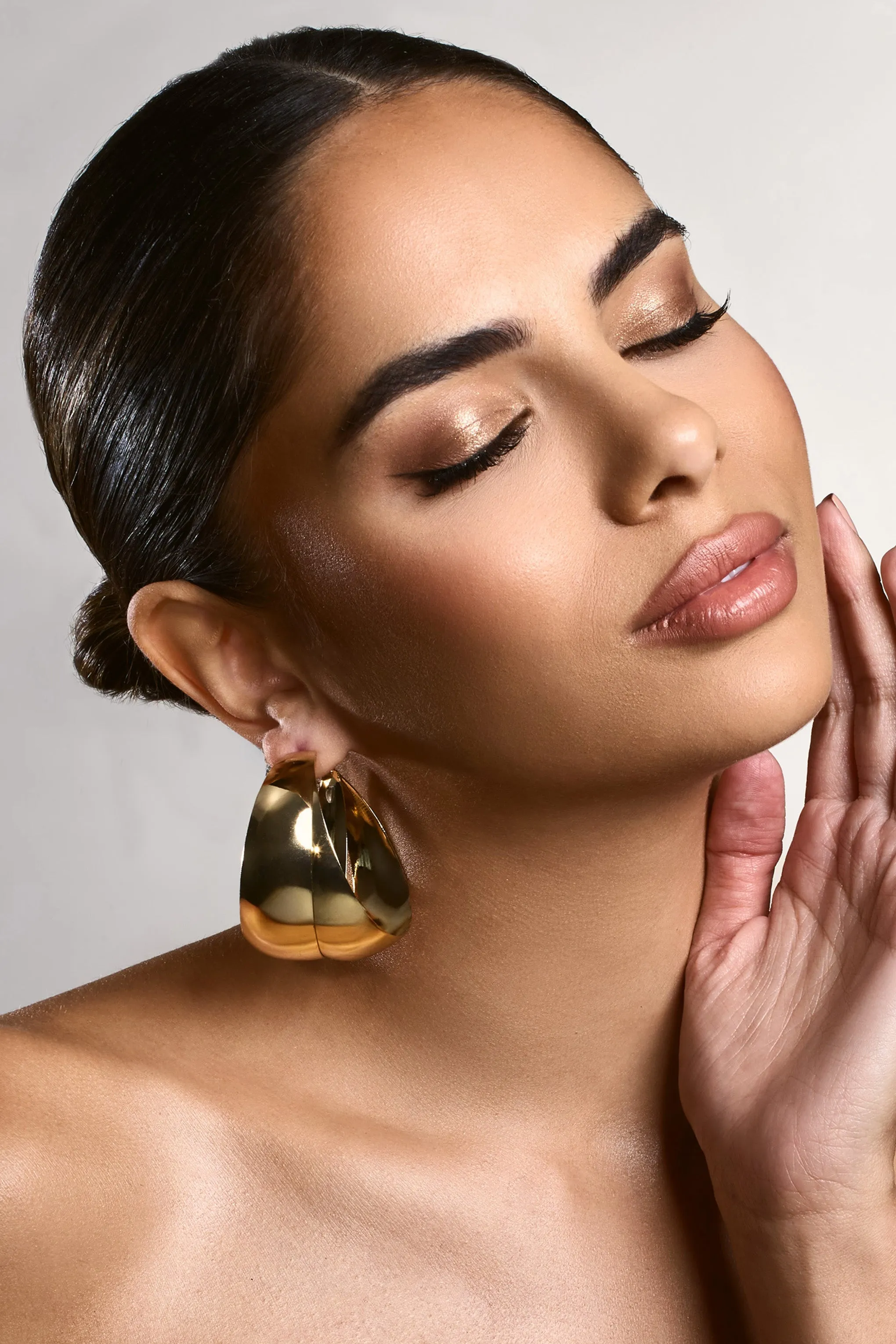 Melania | Gold Chunky Layered Hoop Earrings sold by Club L London product image thumbnail 3