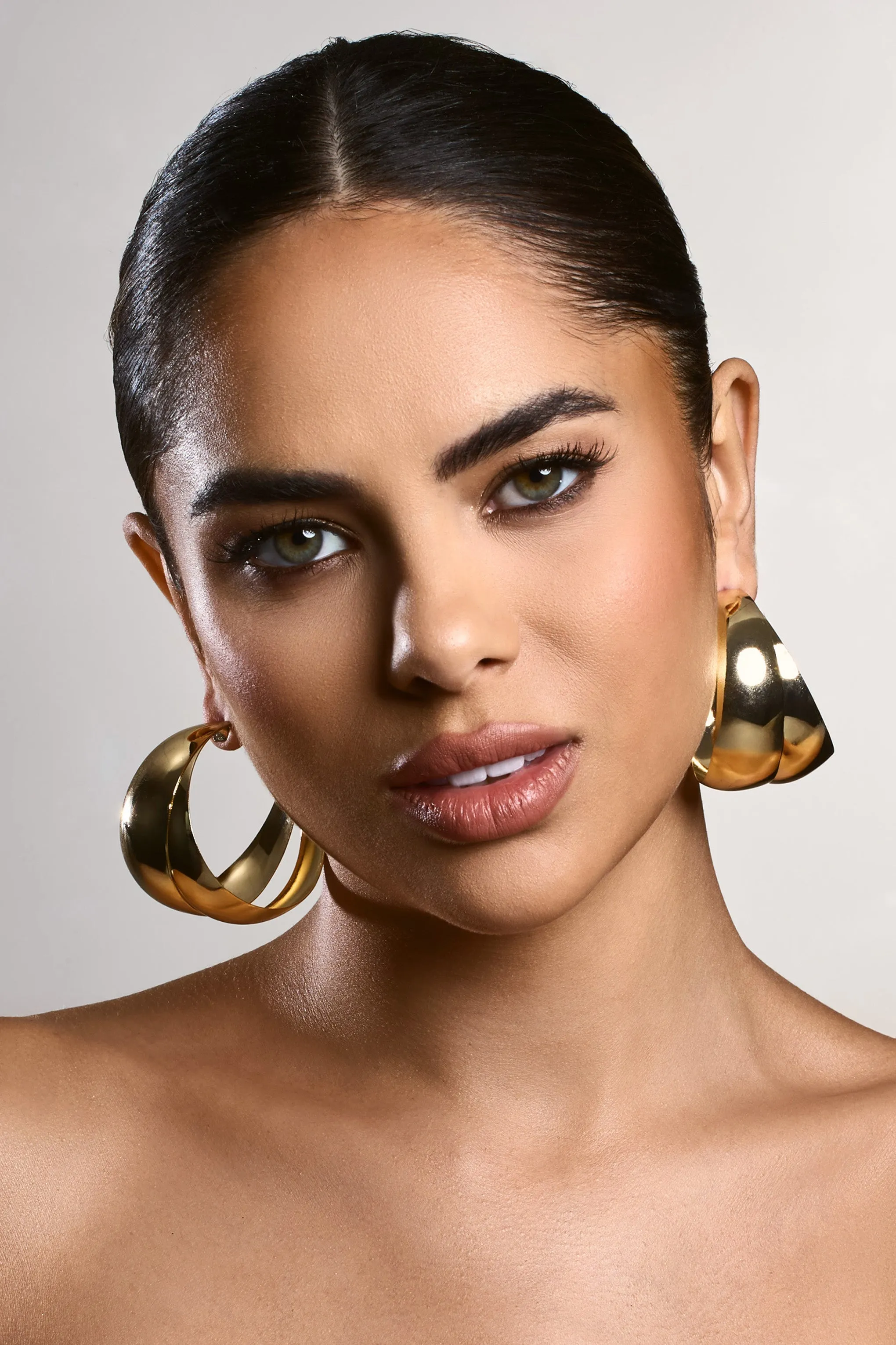 Melania | Gold Chunky Layered Hoop Earrings sold by Club L London product image thumbnail 2