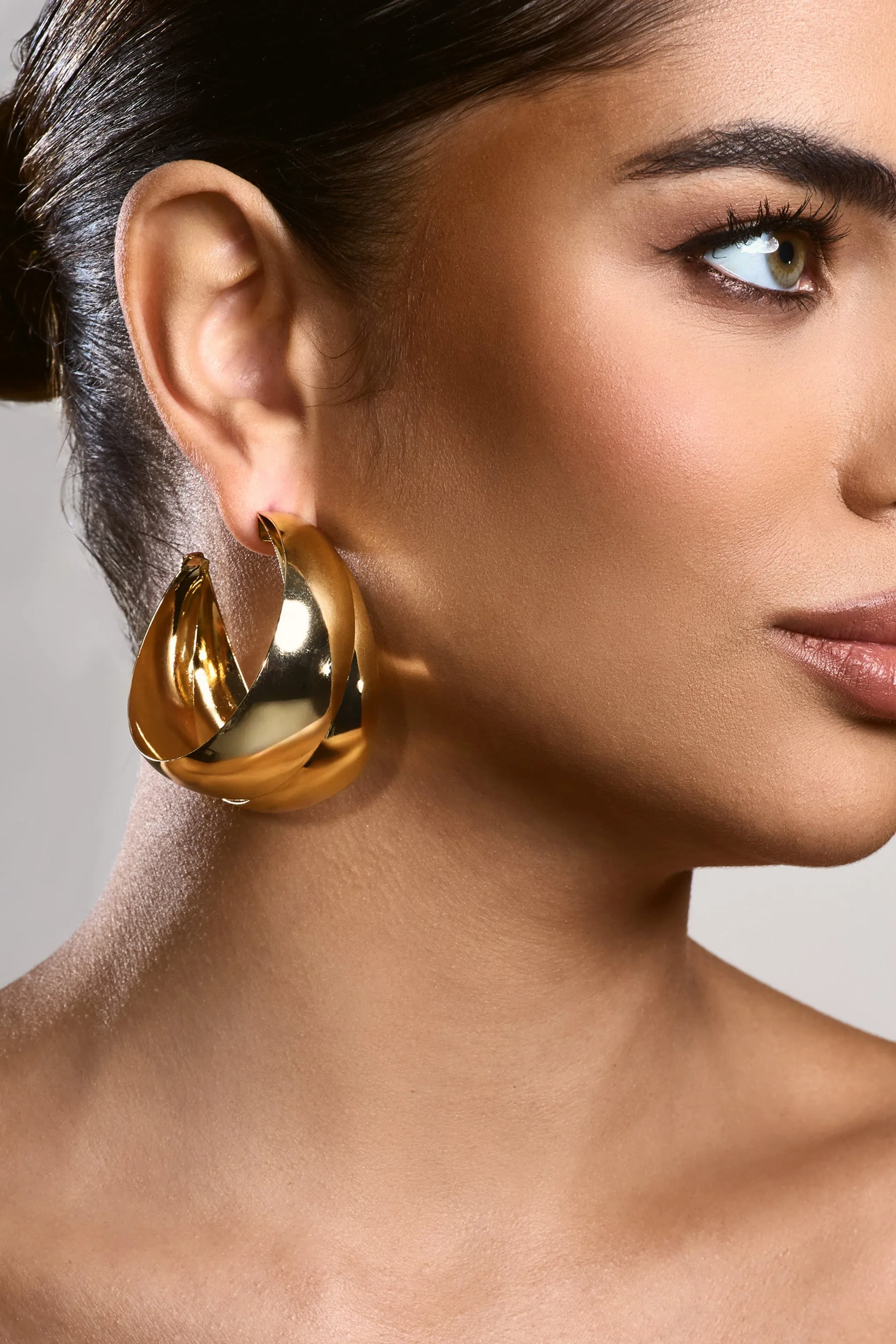 Melania | Gold Chunky Layered Hoop Earrings sold by Club L London product image thumbnail 5