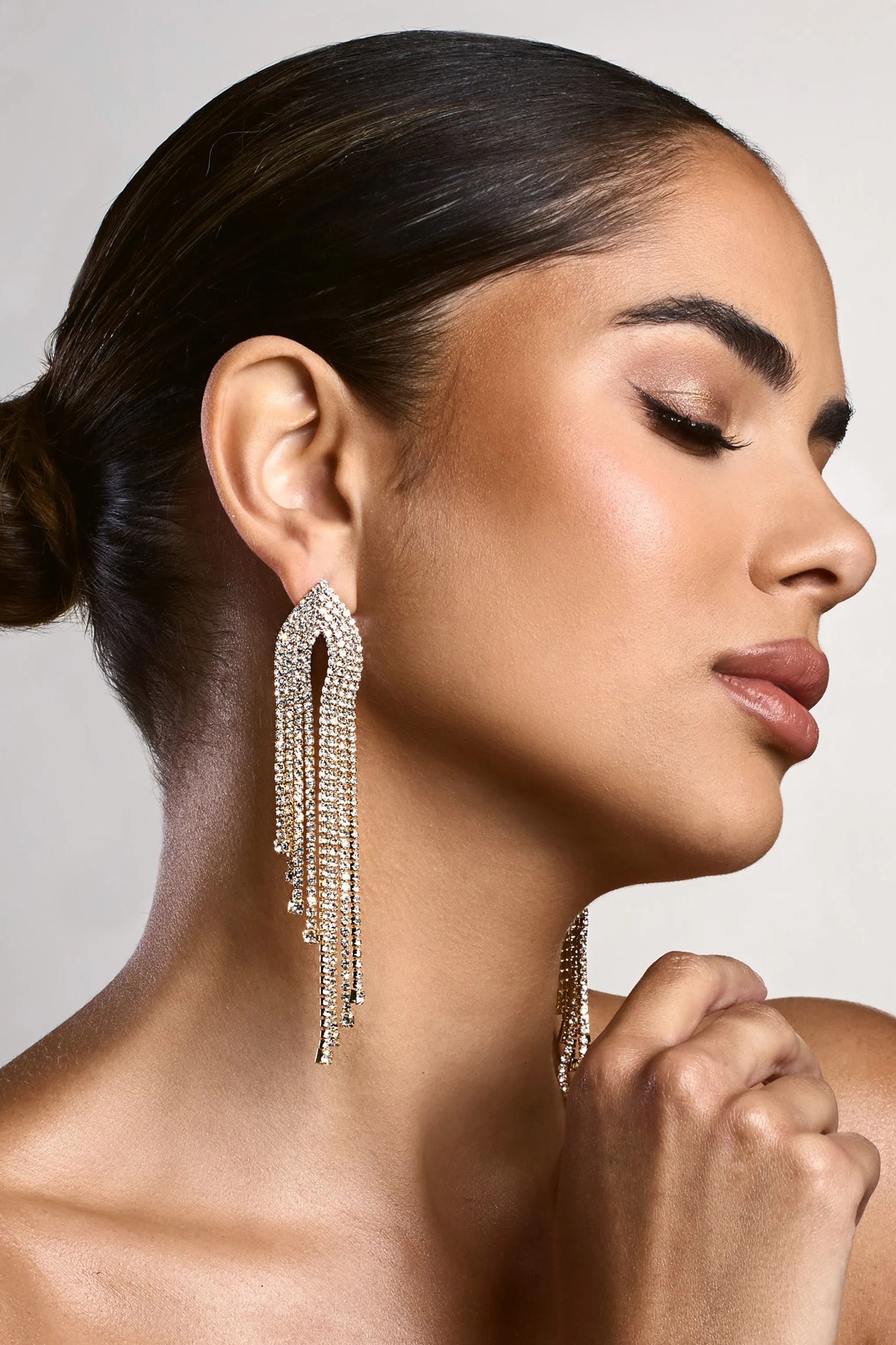 Fabrizia | Gold Diamante Tassel Earrings sold by Club L London