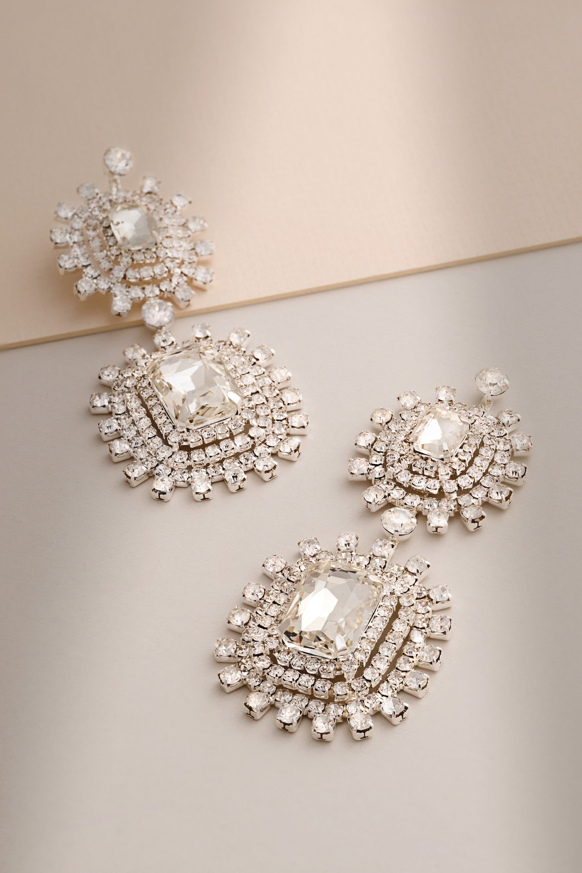 Sharie | Silver Diamante Drop Earrings sold by Club L London