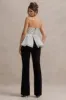 Divina | White & Black Polka Dot Strapless Ruffled Jumpsuit sold by Club L London