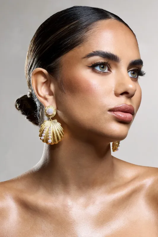 Seashell | Gold Shell Pearl Drop Earrings sold by Club L London