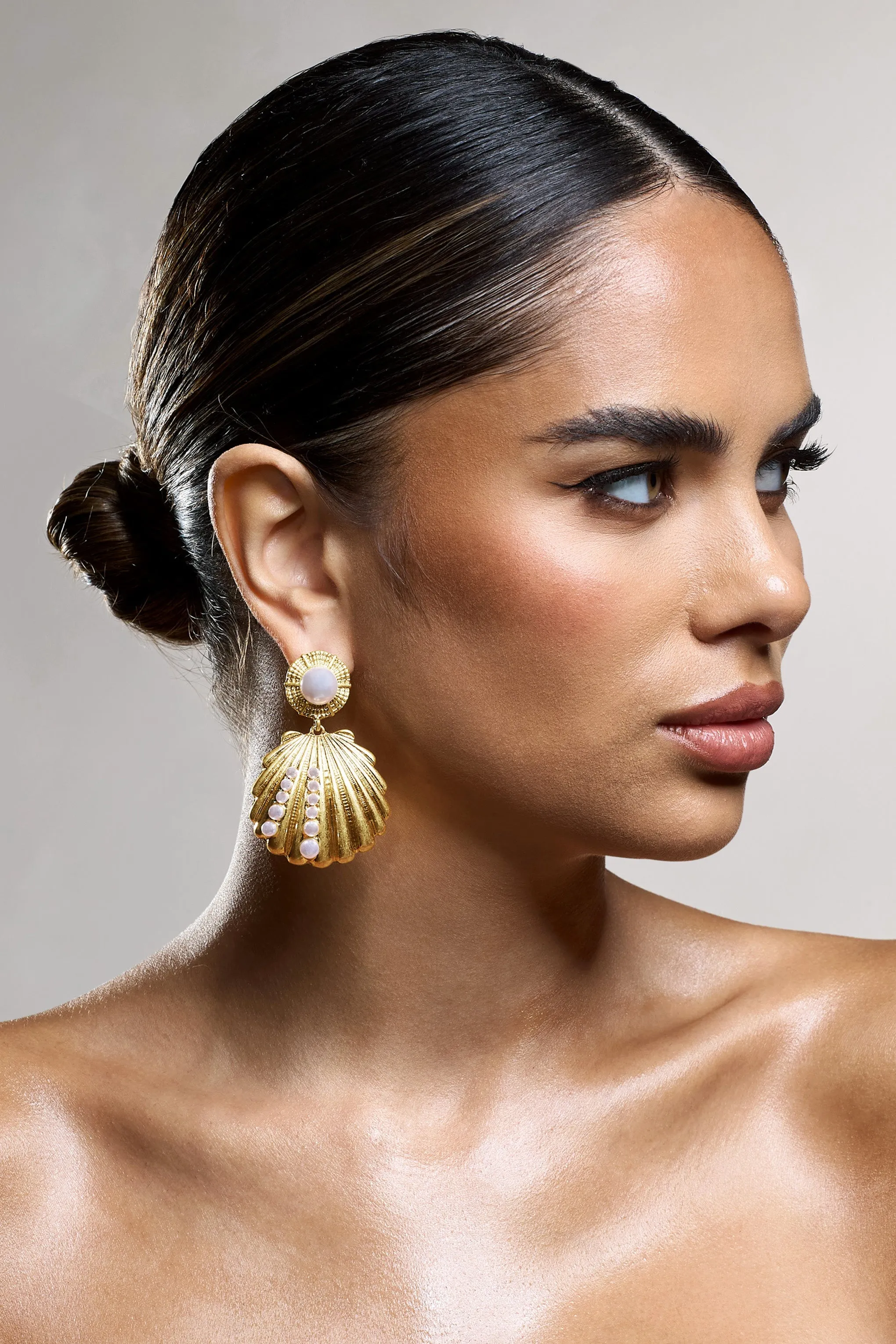 Seashell | Gold Shell Pearl Drop Earrings sold by Club L London product image thumbnail 2