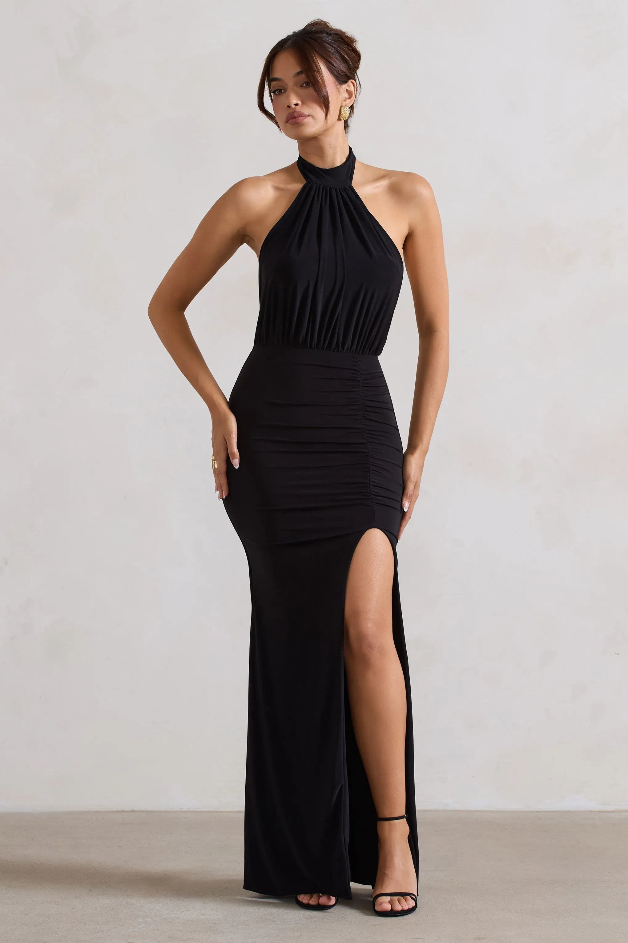 Forever Dreaming | Black Backless Halter Neck Ruched Split Maxi Dress sold by Club L London