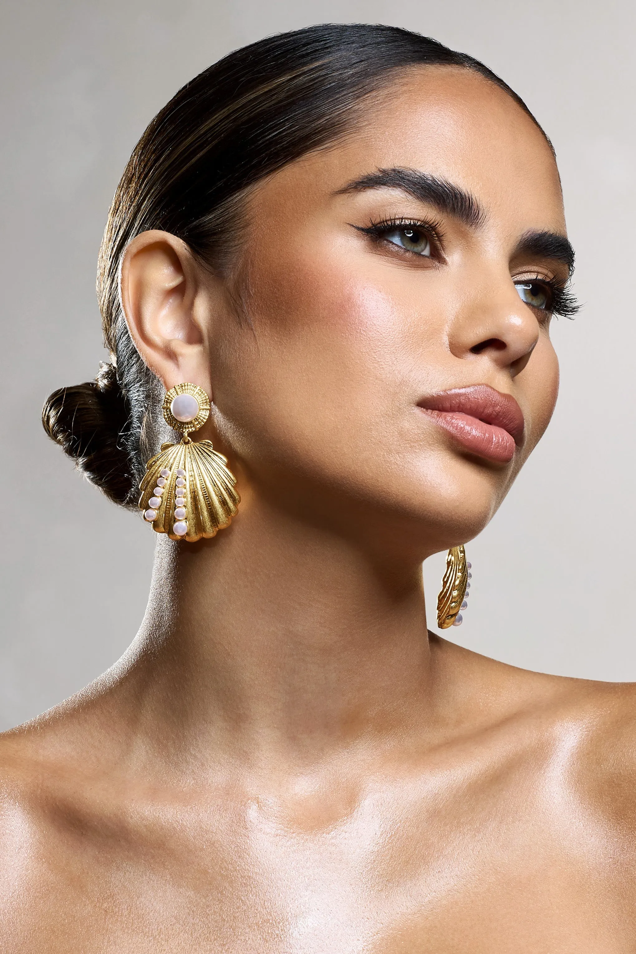 Seashell | Gold Shell Pearl Drop Earrings sold by Club L London product image thumbnail 4