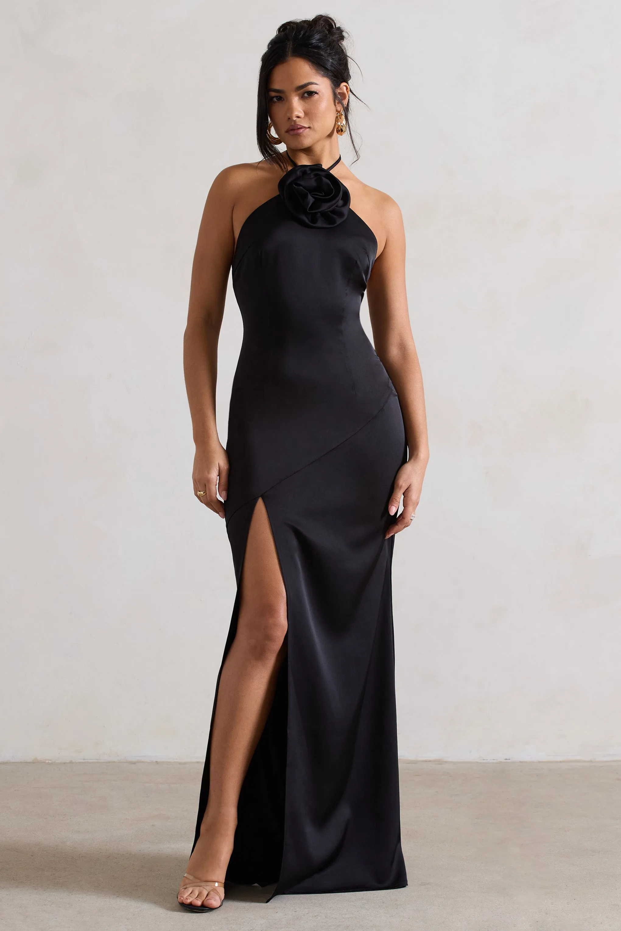 Cesca | Black Satin Halter-Neck Maxi Dress With Flower Corsage sold by Club L London