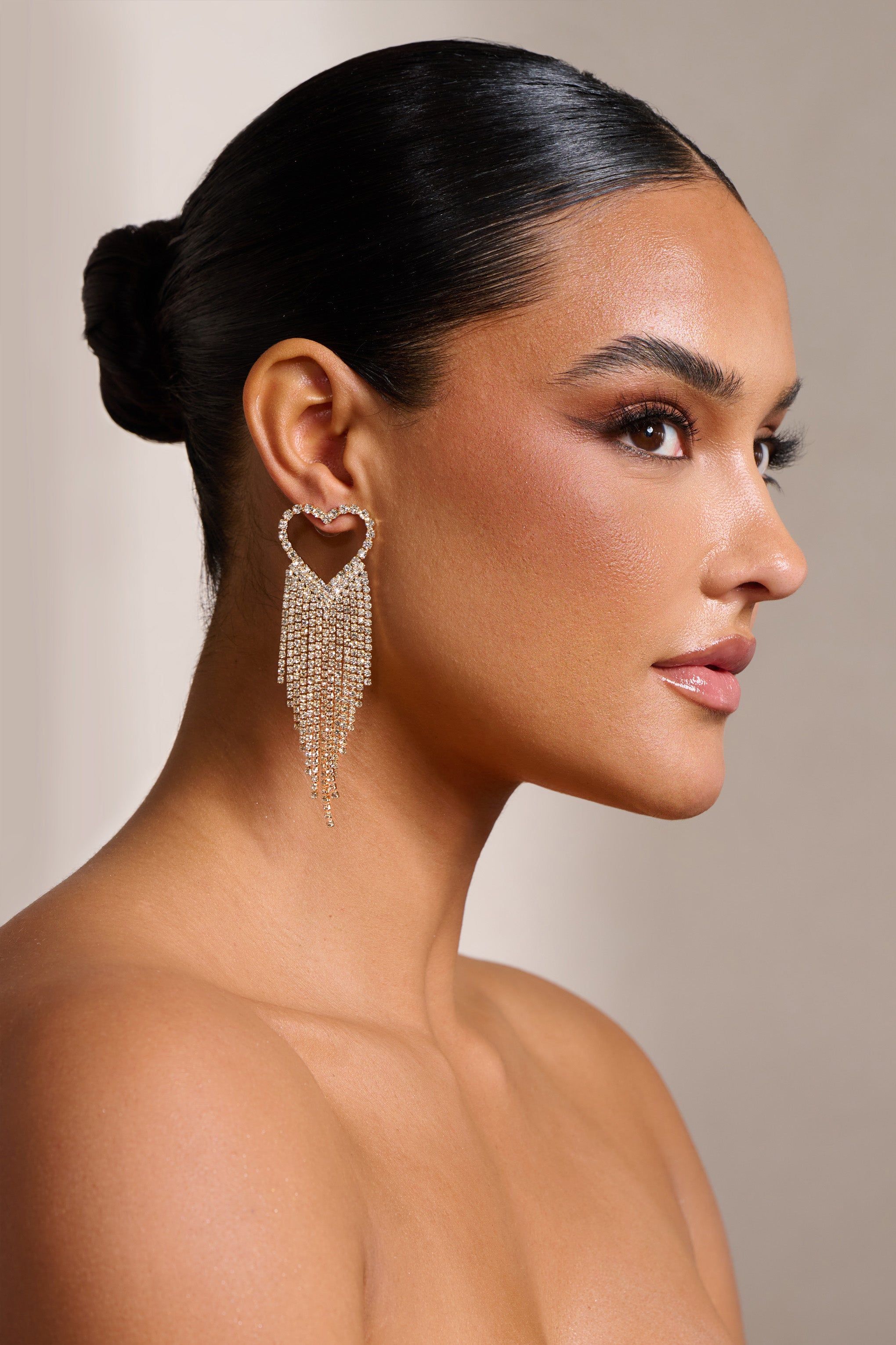 Kathryn | Gold Diamante Heart Shaped Tassel Earrings sold by Club L London product image thumbnail 3