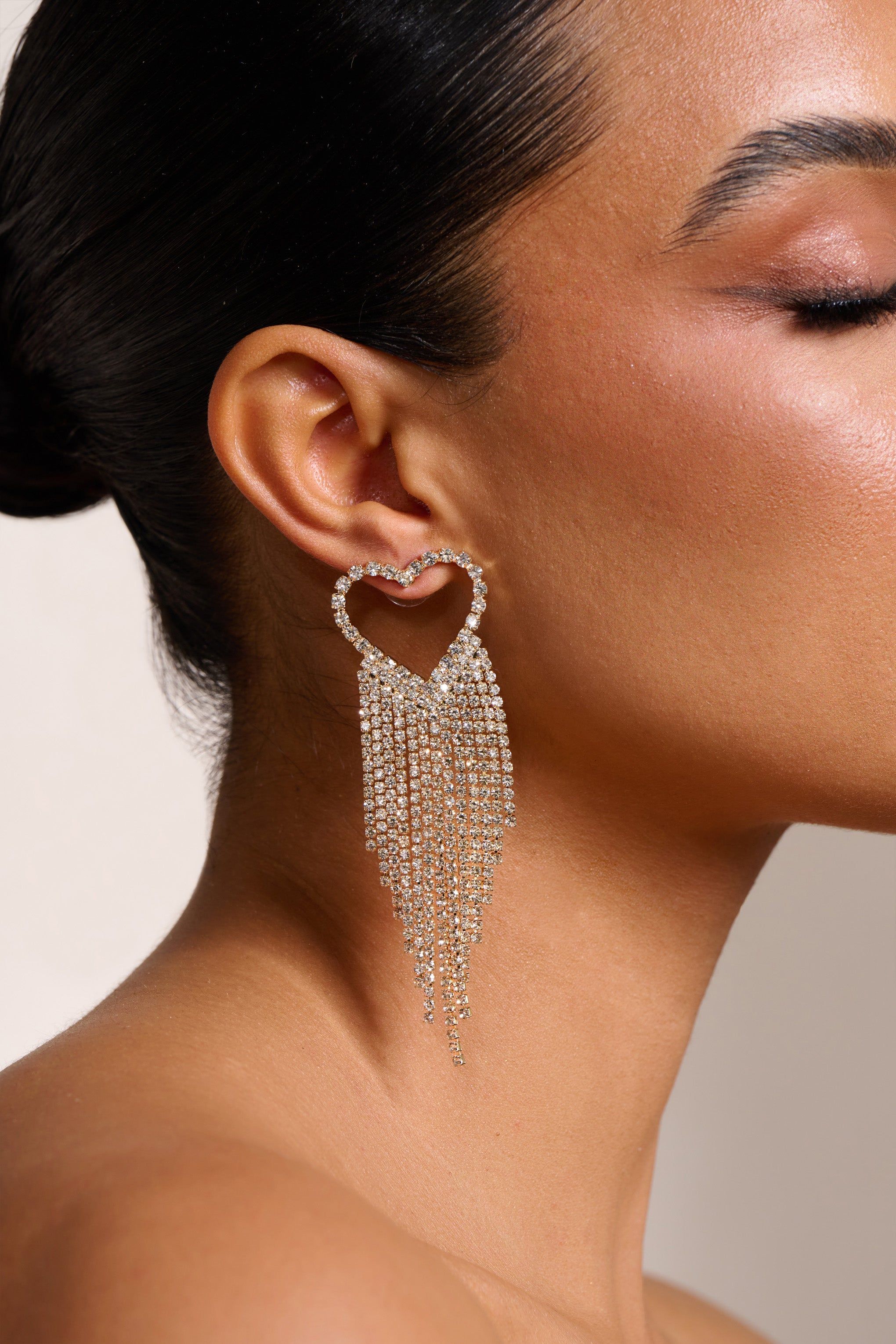 Kathryn | Gold Diamante Heart Shaped Tassel Earrings sold by Club L London product image thumbnail 2