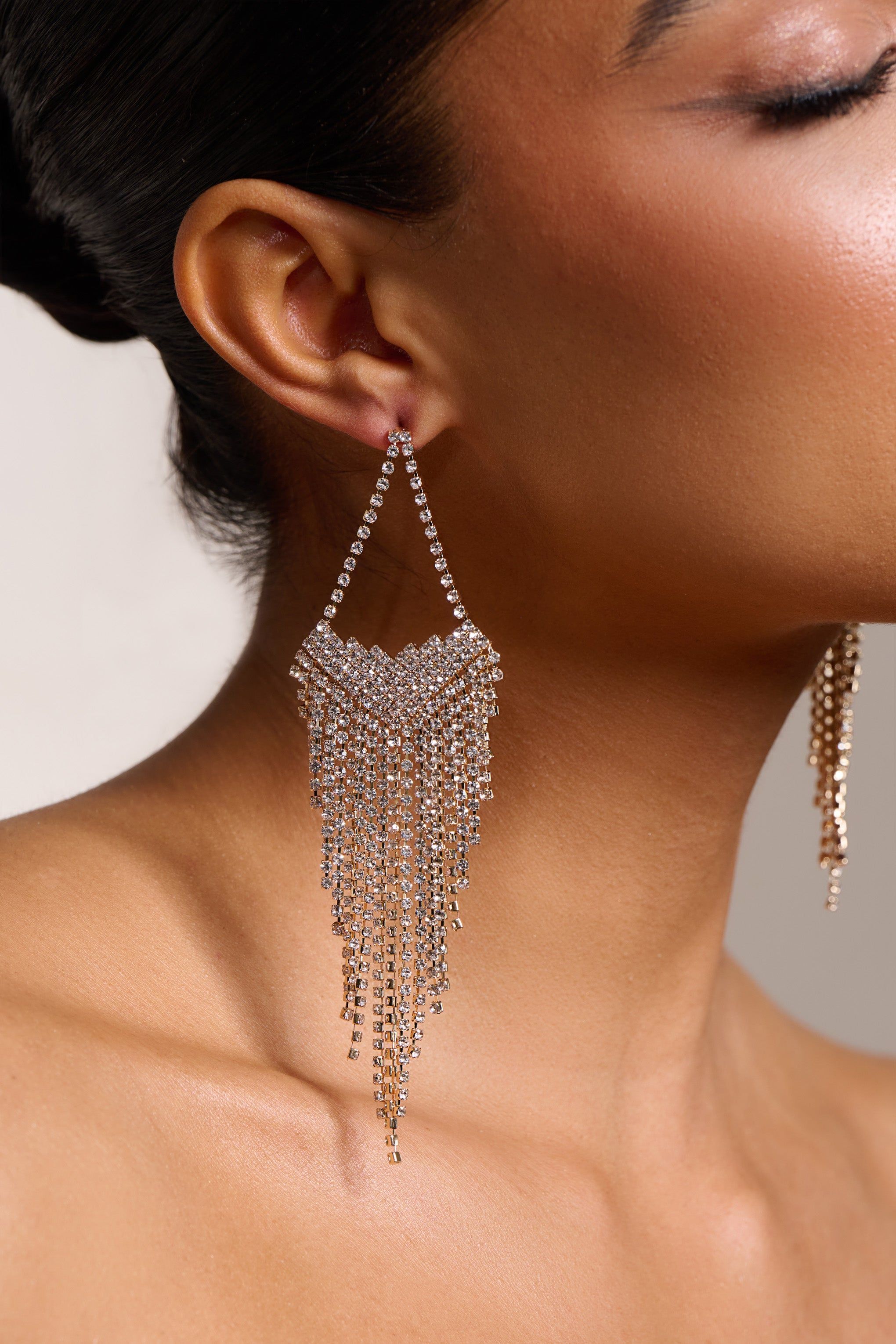 Cassandra | Gold Diamante Tassel Drop Earrings sold by Club L London product image thumbnail 2