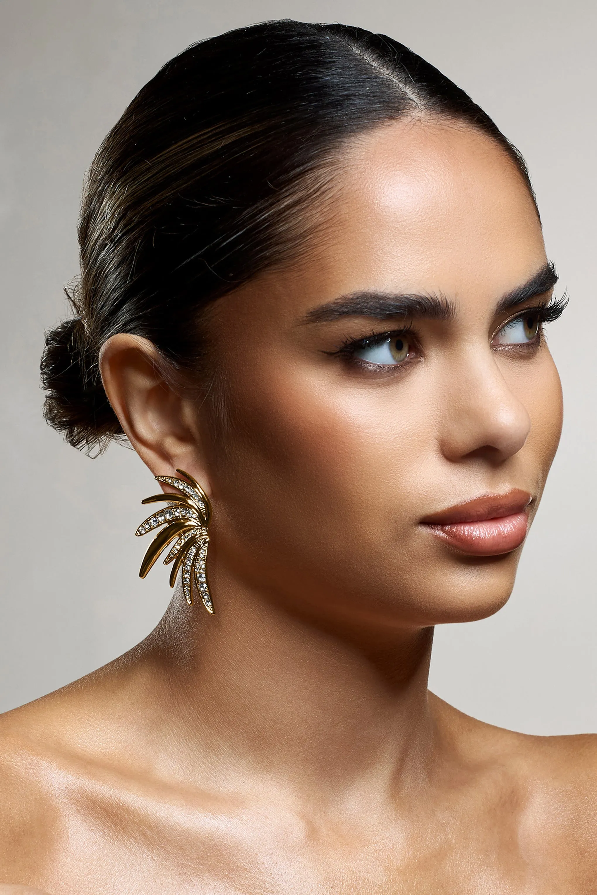 Curious | Gold Diamante Half Leaf Earrings sold by Club L London product image thumbnail 3