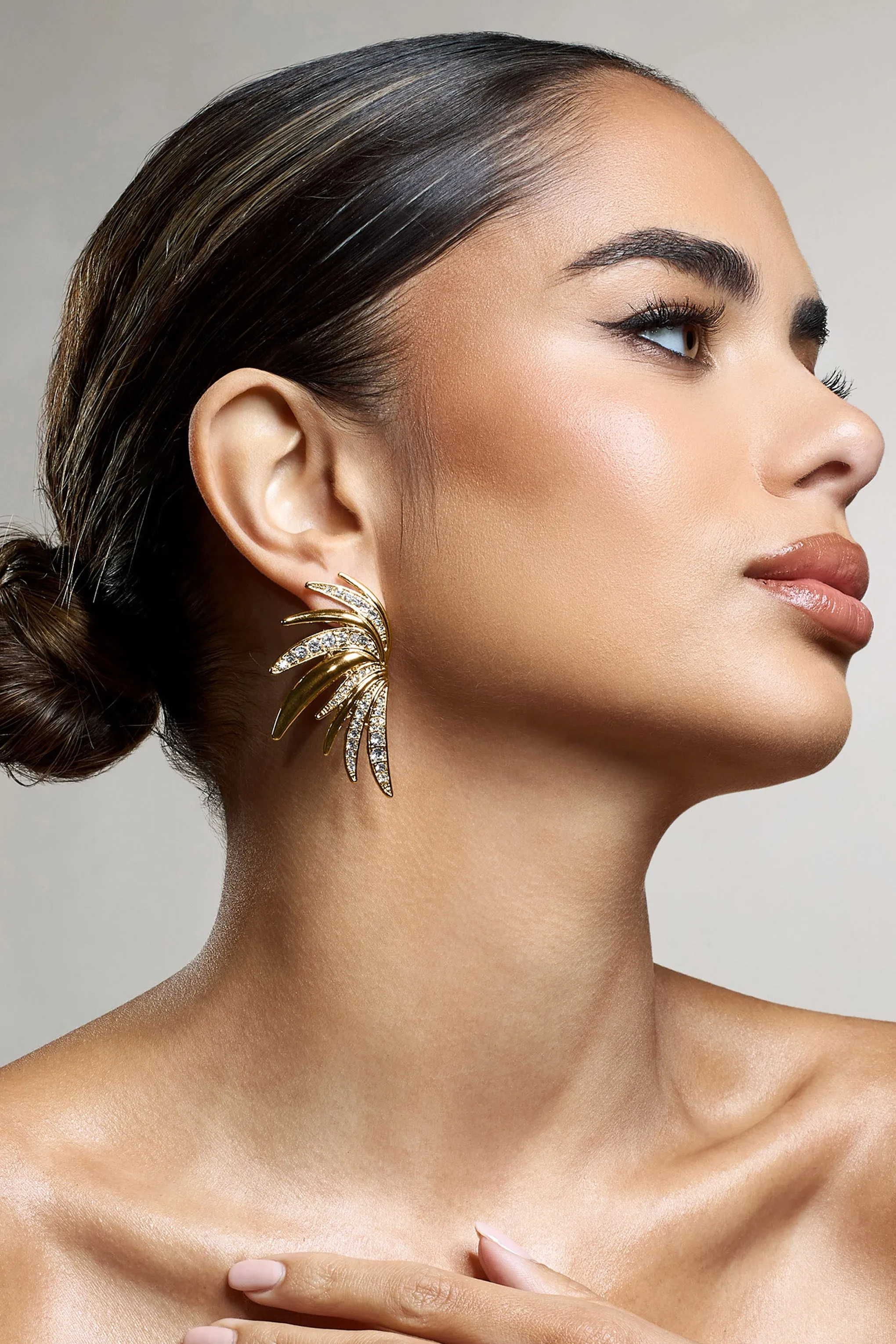 Curious | Gold Diamante Half Leaf Earrings sold by Club L London product image thumbnail 2