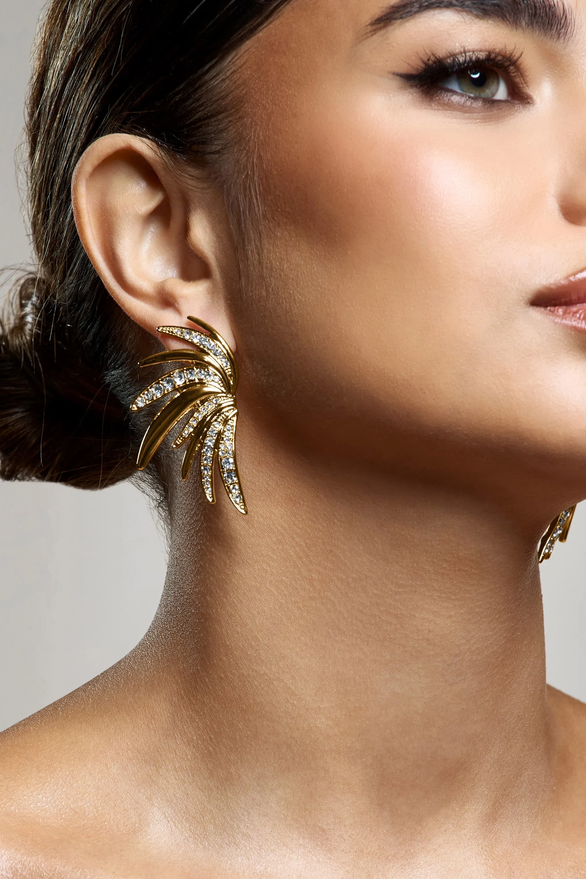 Curious | Gold Diamante Half Leaf Earrings sold by Club L London product image thumbnail 4