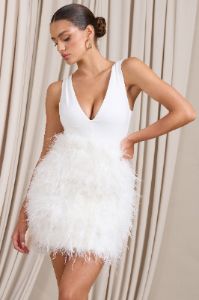 Flirt | White Plunge Front Mini Dress With Feather Skirt sold by Club L London
