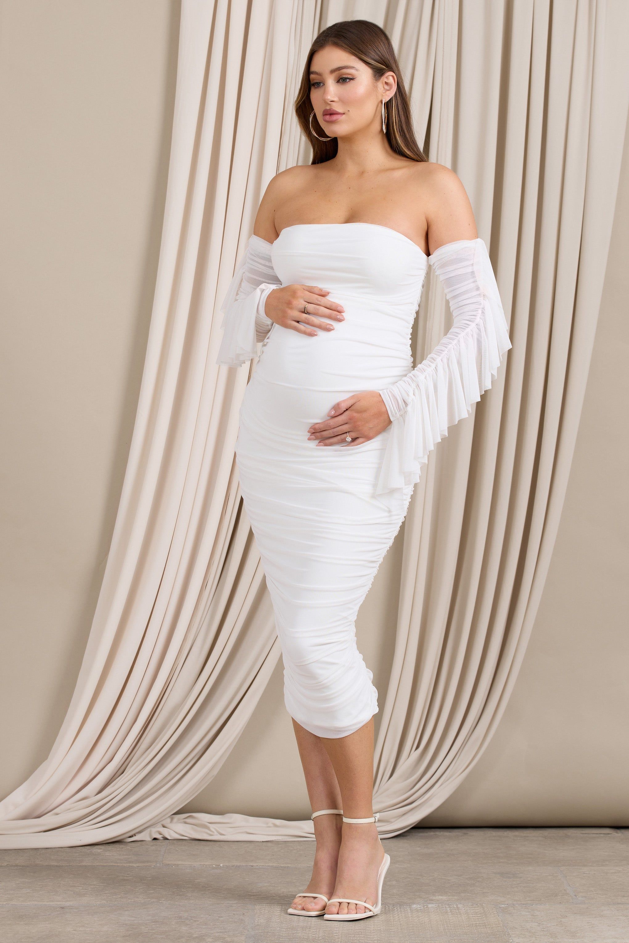 Aroma | White Ruched Mesh Maternity Midi Dress With Ruffled Sleeves sold by Club L London