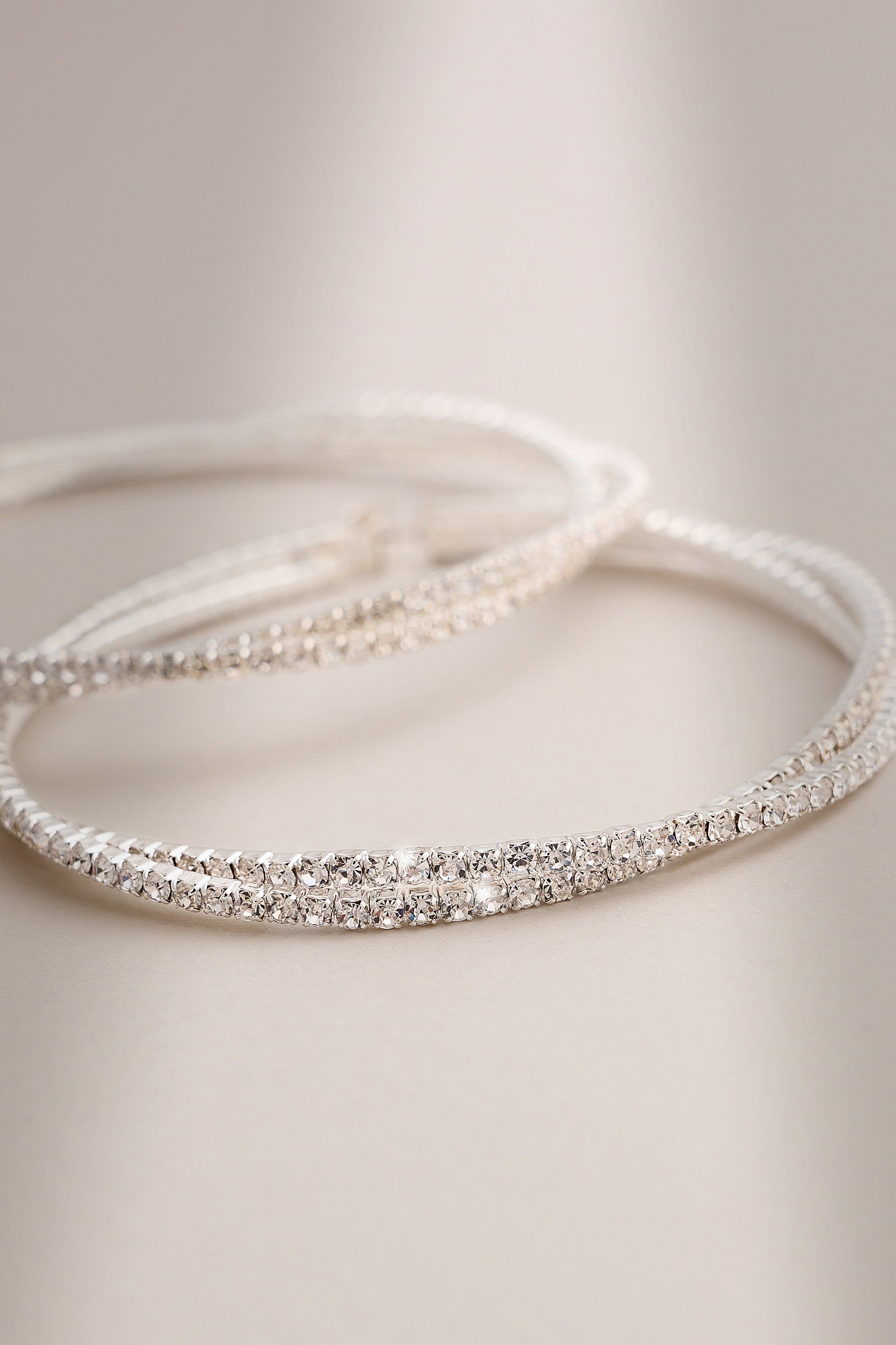 Lila | Silver Twisted Large Hoops sold by Club L London product image thumbnail 3