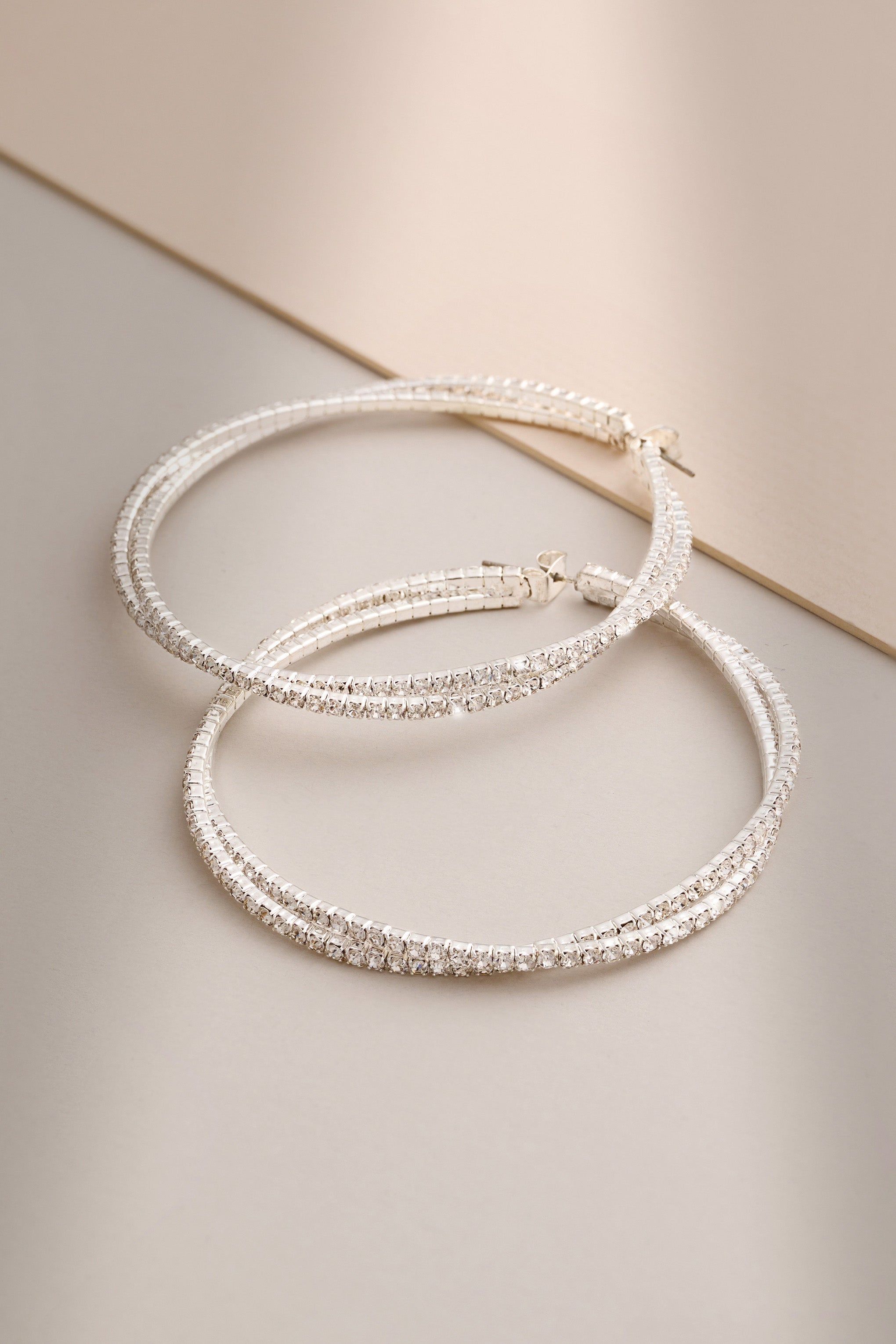 Lila | Silver Twisted Large Hoops sold by Club L London product image thumbnail 4