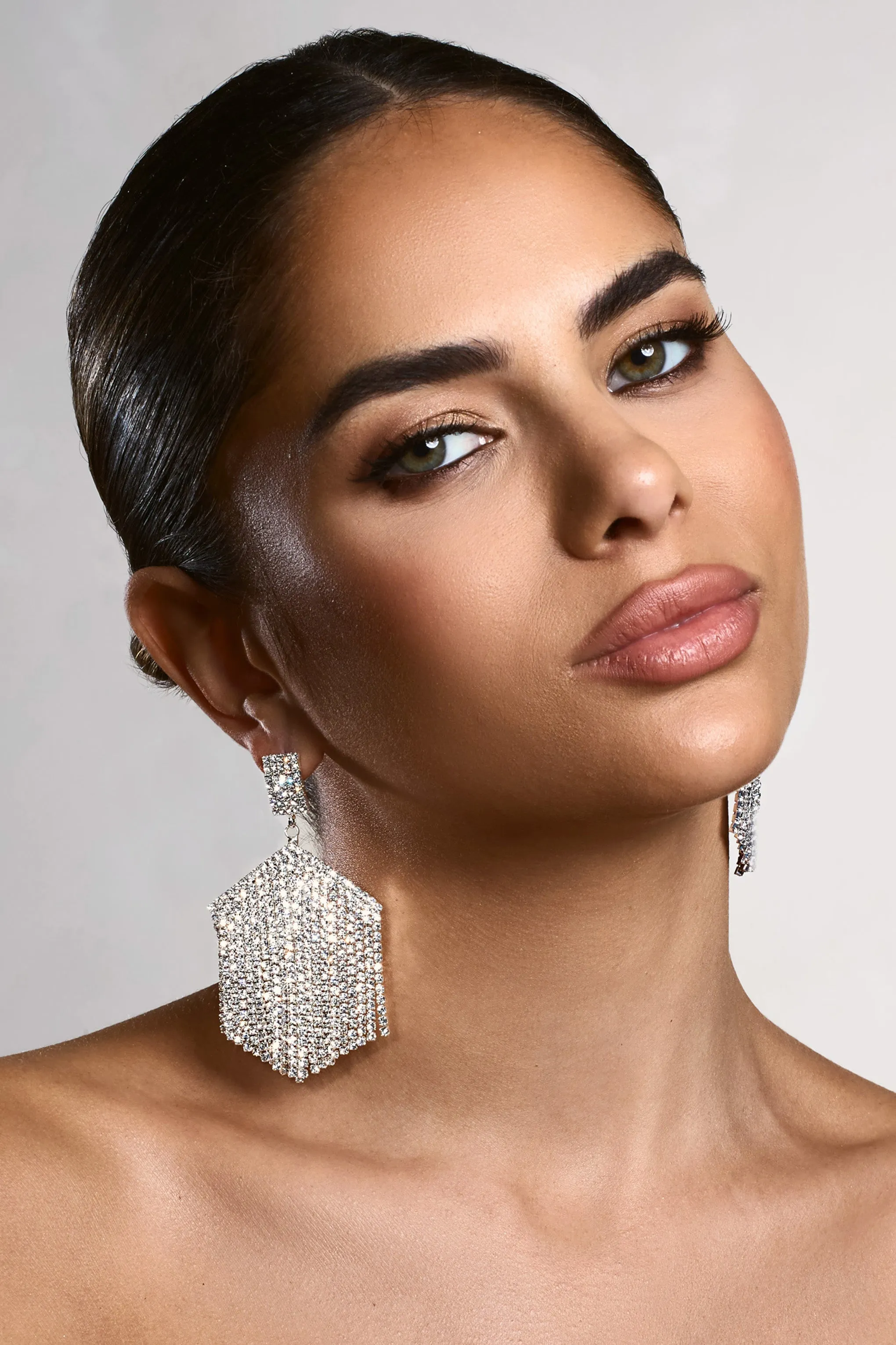 Alaina | Silver Diamante Tassel Drop Earrings sold by Club L London