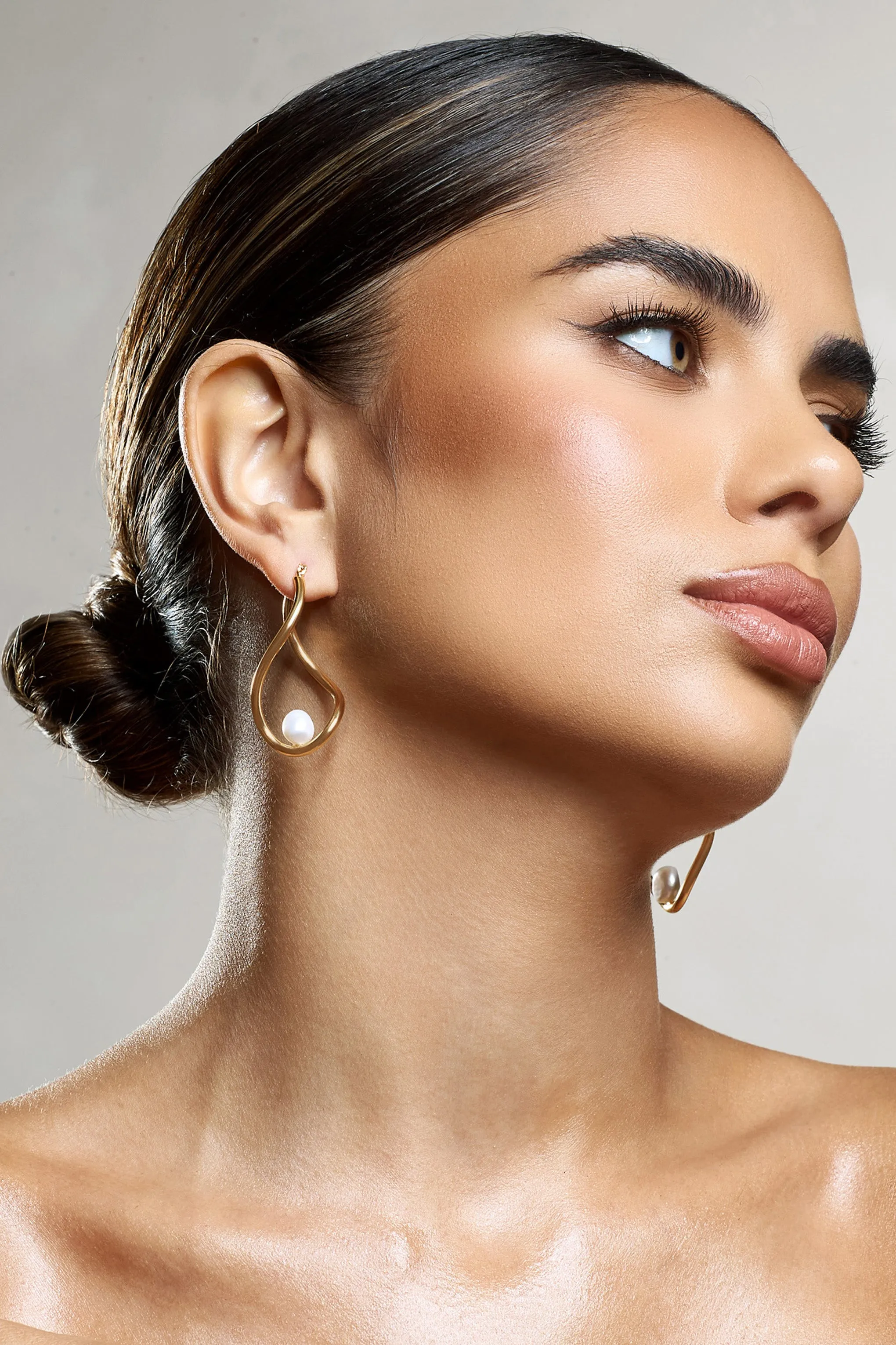 Louise | Gold Pearl Twisted Hoop Earrings sold by Club L London product image thumbnail 2