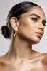 Eclat | Gold Ribbed Dangle Earrings sold by Club L London