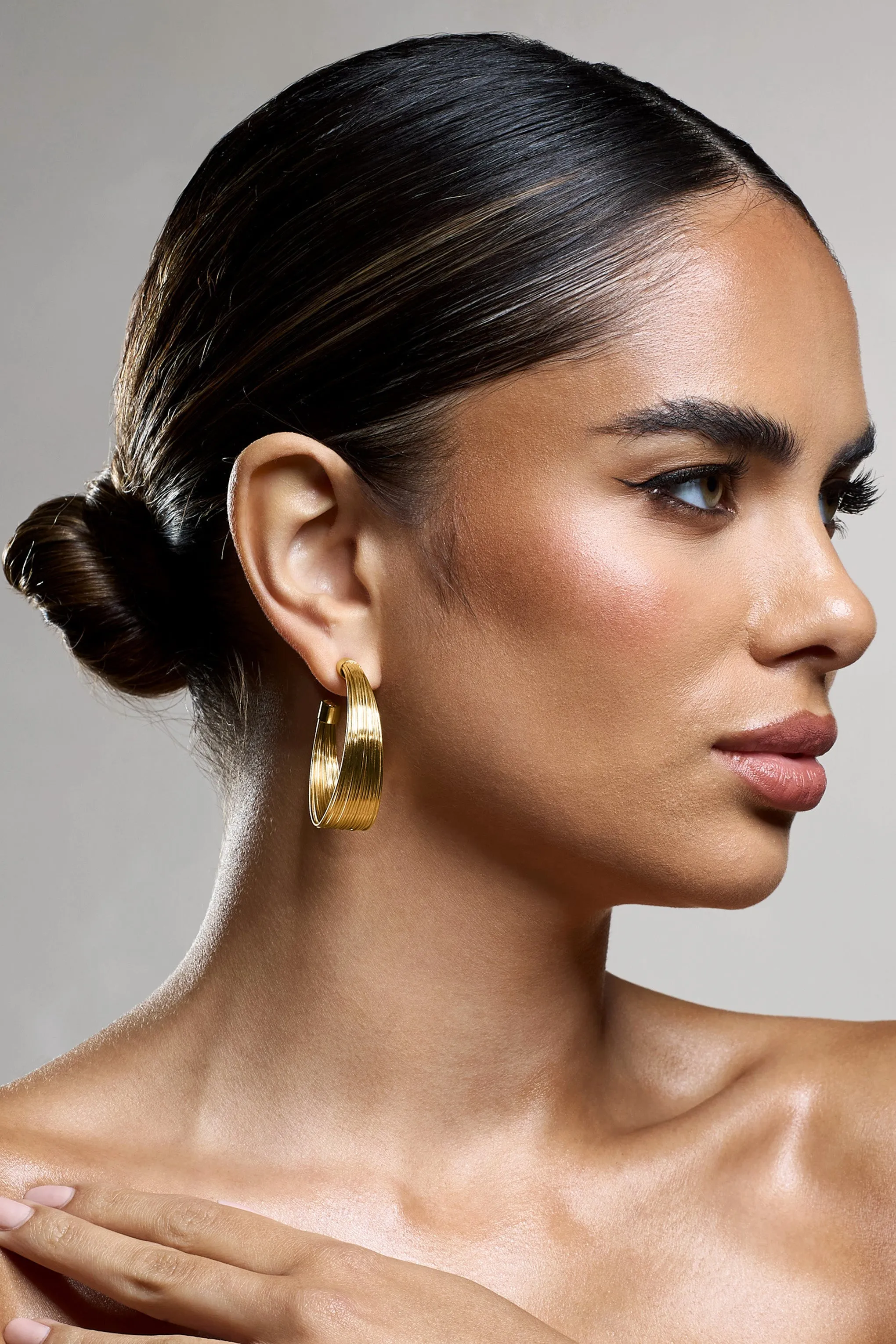 Stori | Gold Layered Hoop Earrings sold by Club L London product image thumbnail 3
