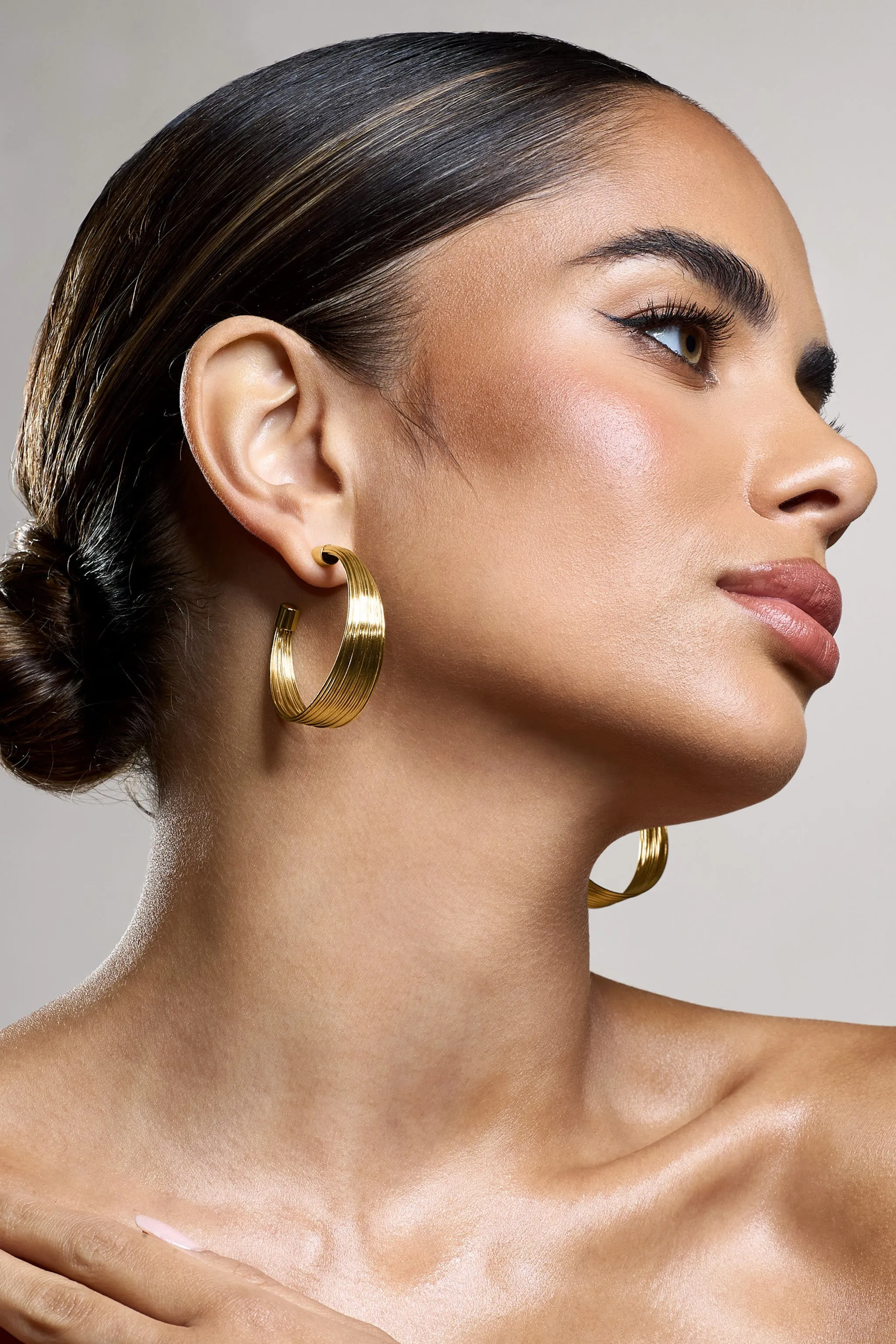 Stori | Gold Layered Hoop Earrings sold by Club L London product image thumbnail 2