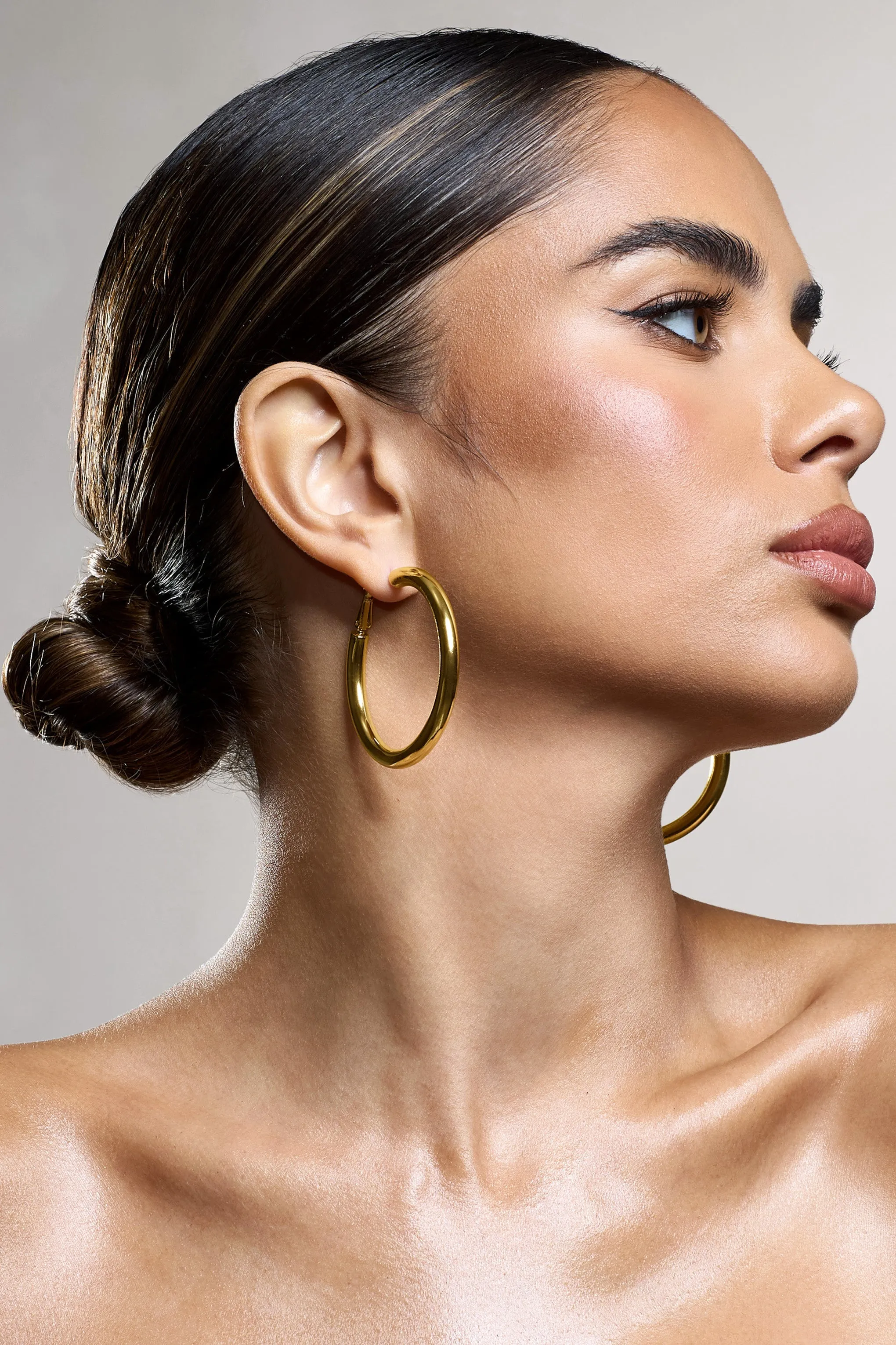 Mira | Gold Hoop Earrings sold by Club L London