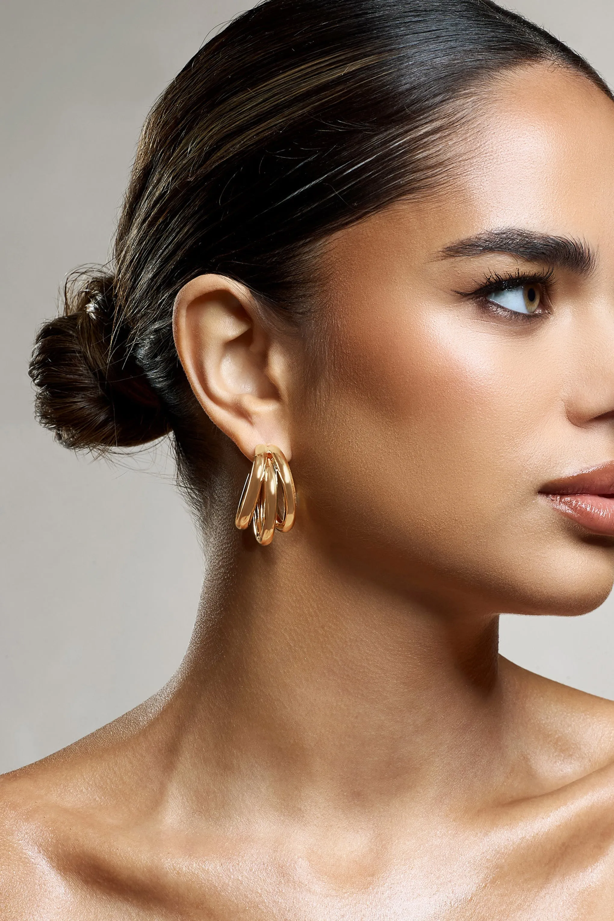 Dua | Gold Layered Hoop Earrings sold by Club L London