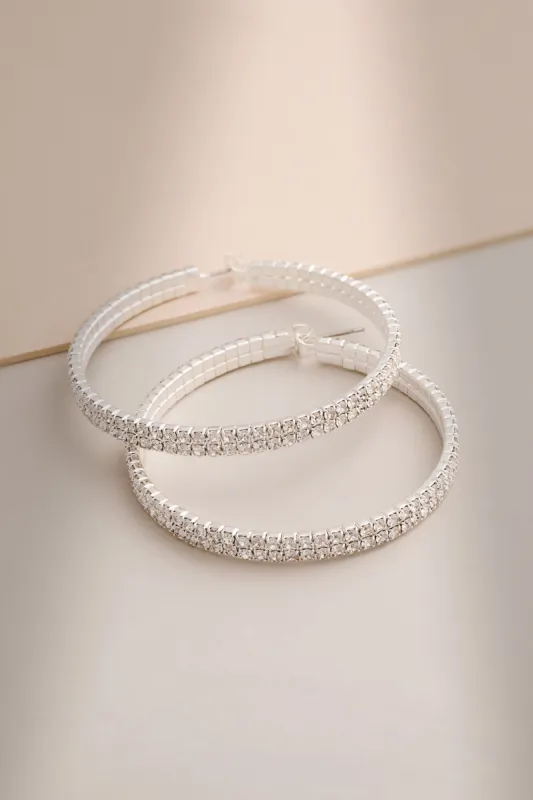 Tyrell | Silver Diamante Hoop Earrings sold by Club L London