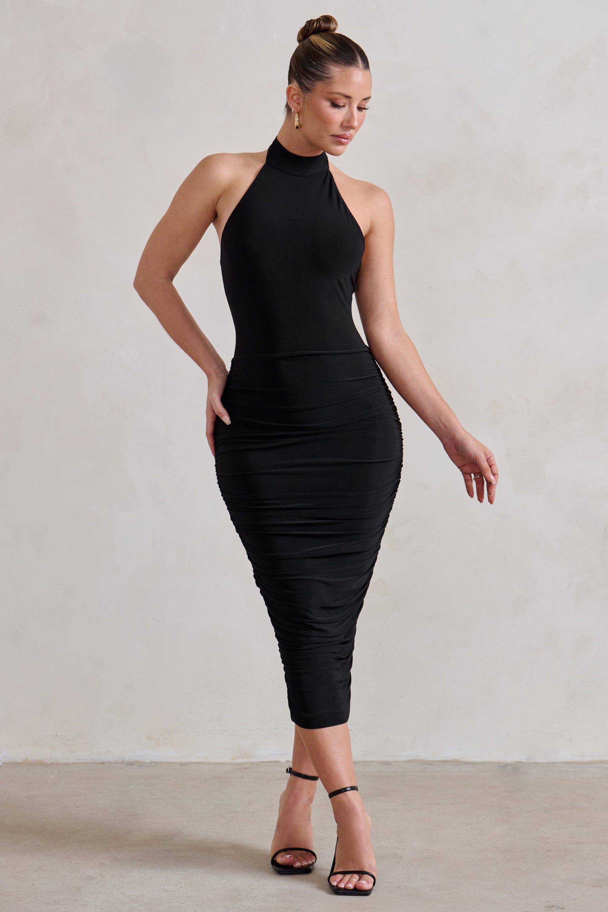 Chrissy | Black Halterneck Ruched Midi Dress sold by Club L London