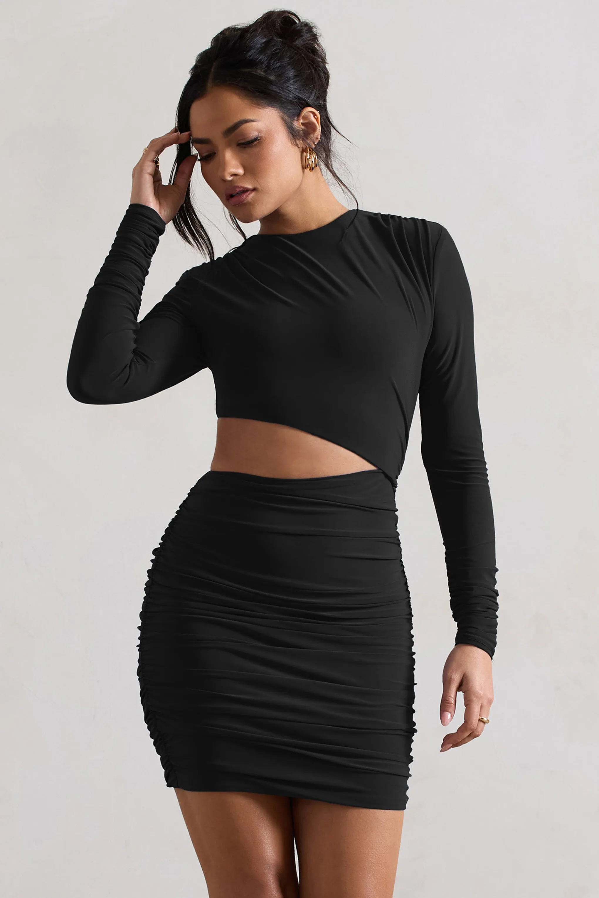 Tana | Black Ruched Bodycon Long Sleeve Cut-Out Mini Dress sold by Club L London