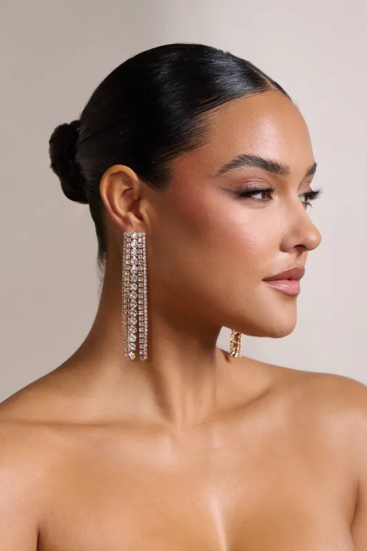 Beverly | Gold Diamante Chain Tassel Earrings sold by Club L London