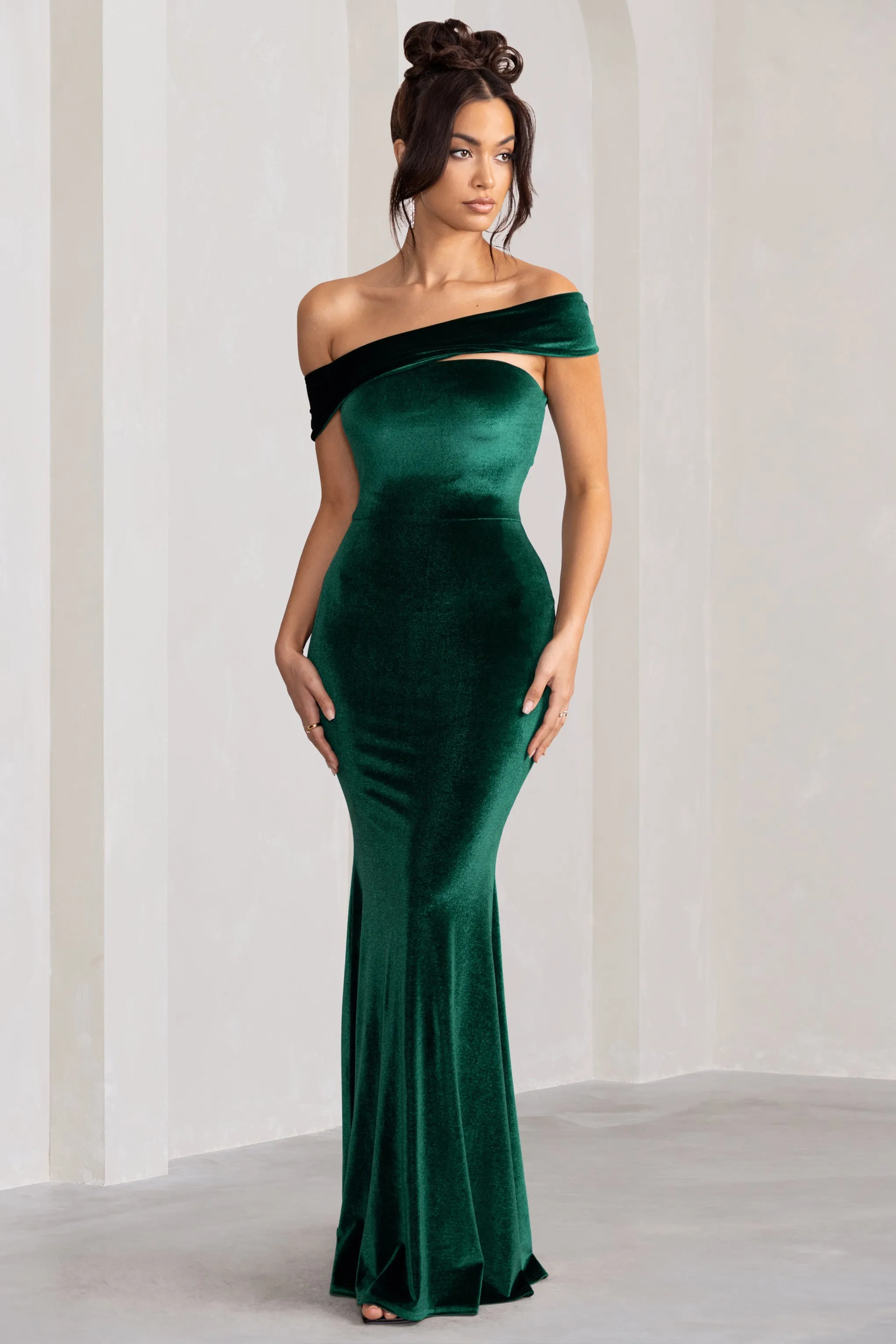 Candela | Bottle Green Velvet Asymmetric Bardot Maxi Dress sold by Club L London
