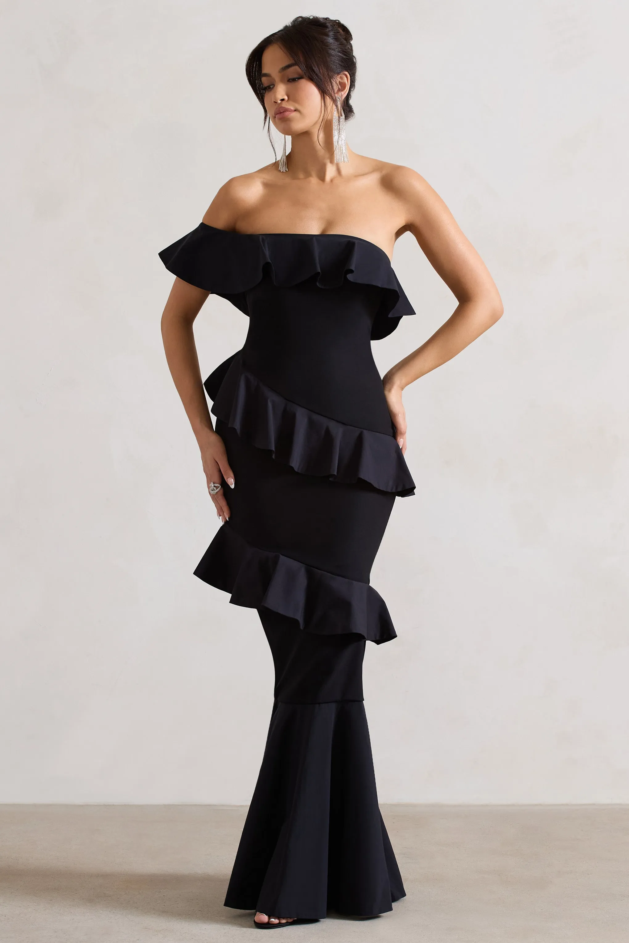 Cinematic | Black Bardot Ruffled Fishtail Maxi Dress sold by Club L London