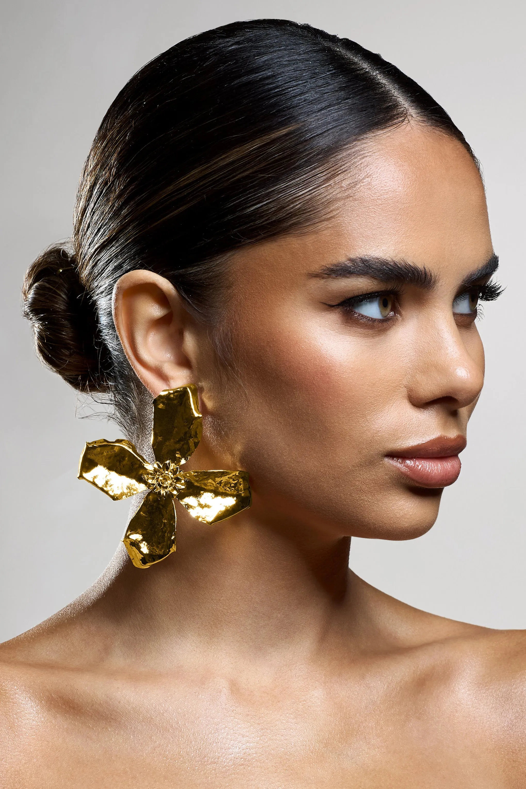 Zinna | Gold Flower Statement Earrings sold by Club L London