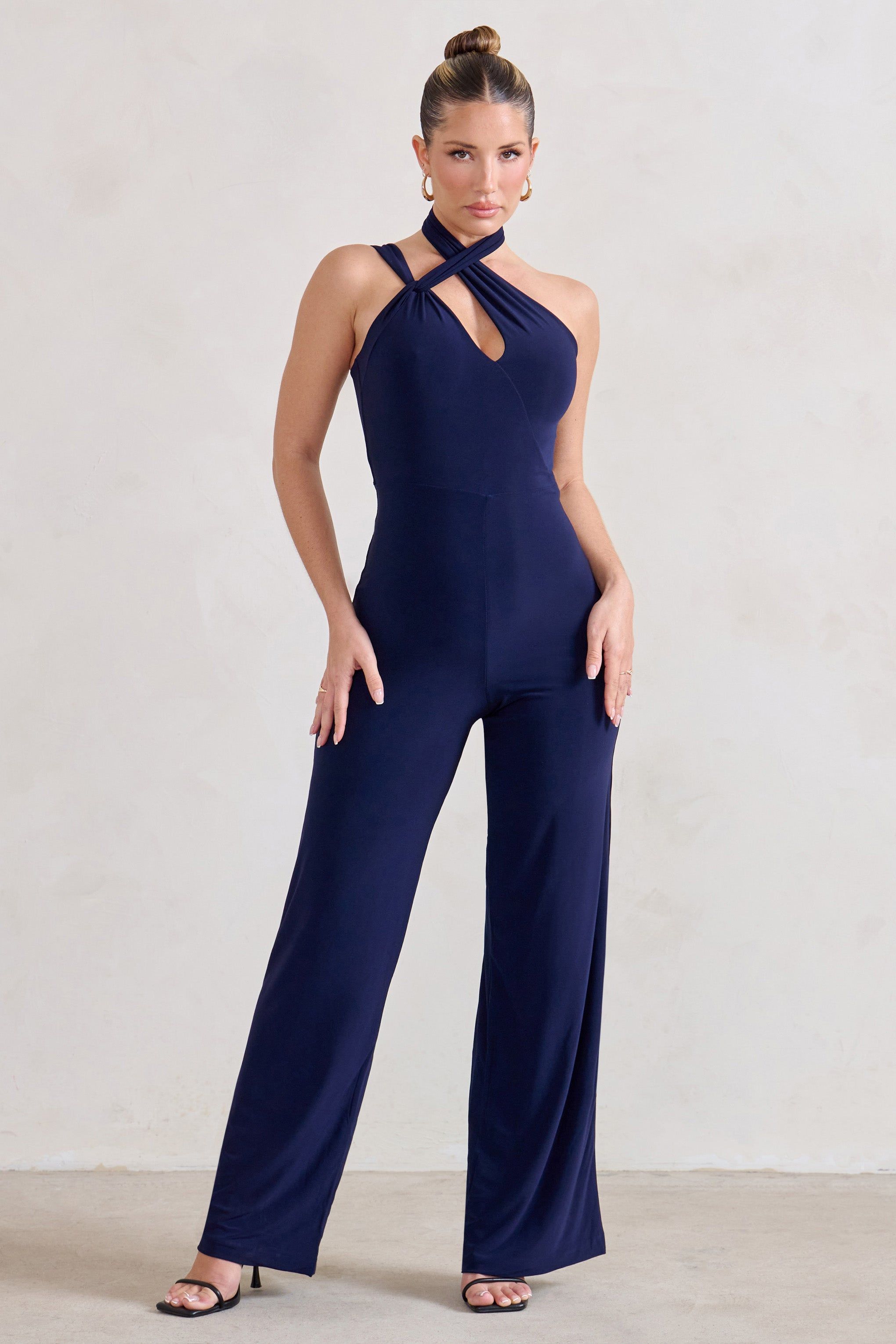 Tilly | Navy Cut Out Halterneck Asymmetrical Jumpsuit sold by Club L London