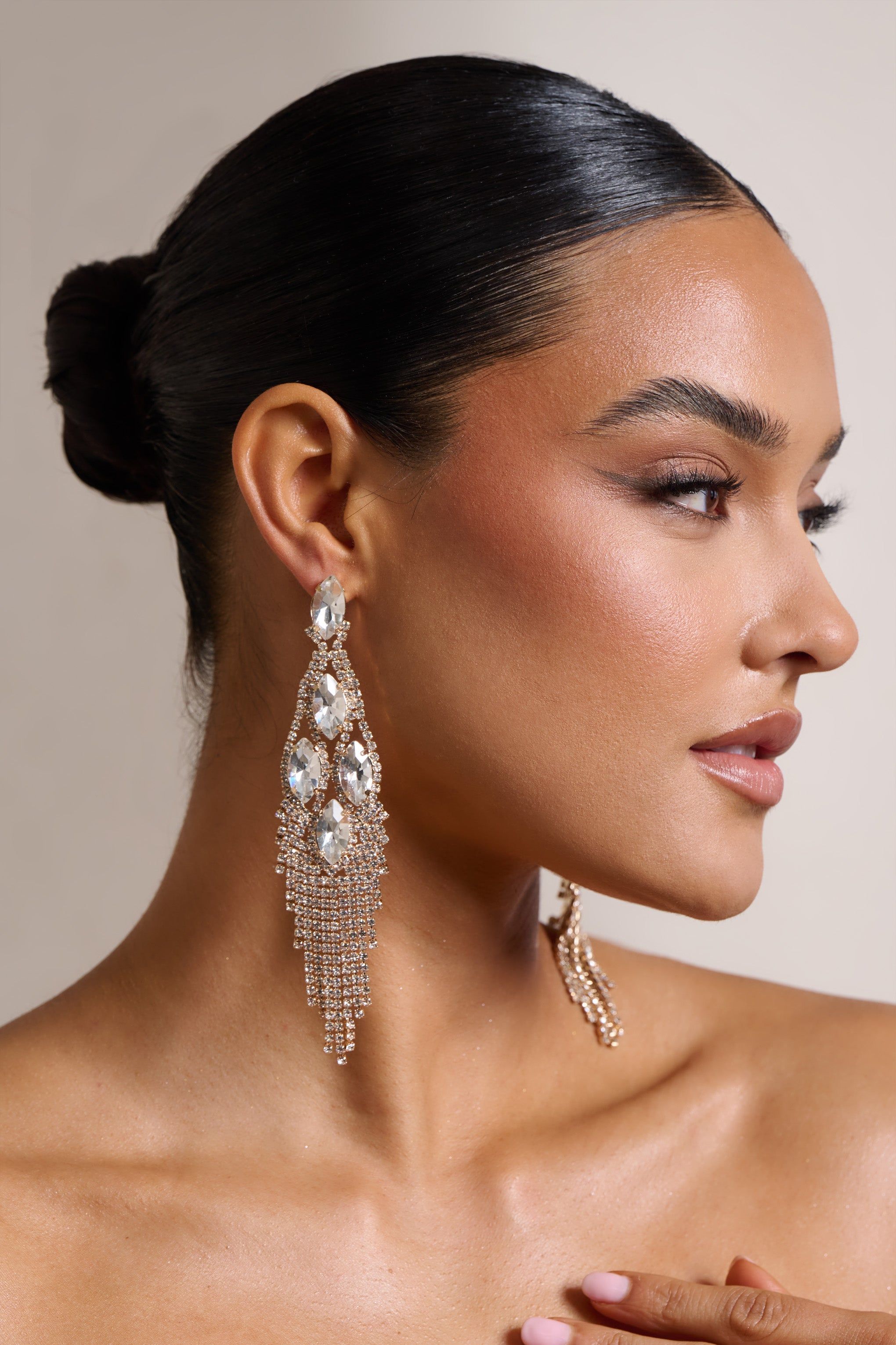 Peony | Gold Diamante Chandelier Drop Earrings sold by Club L London