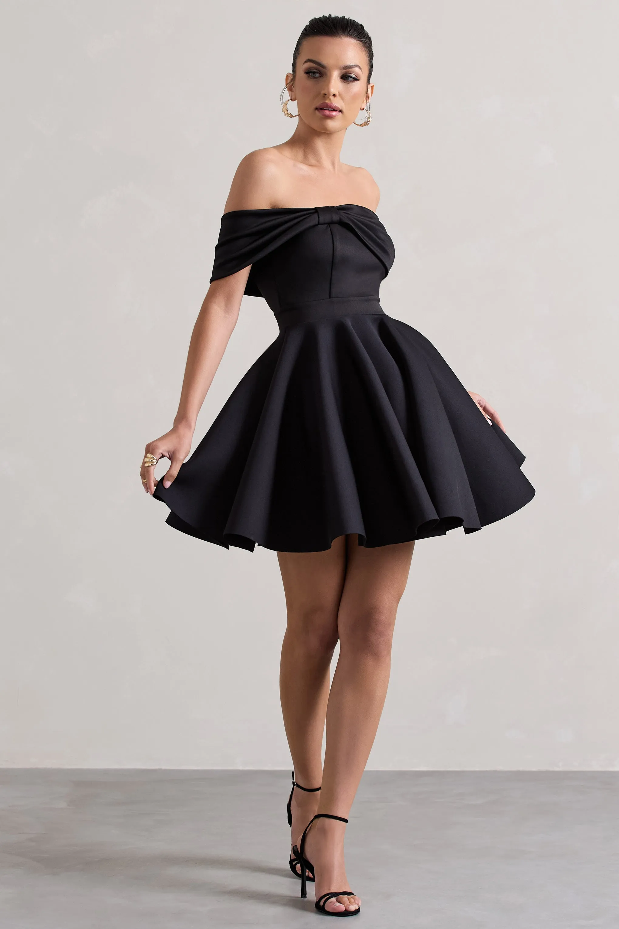 Snowfall | Black Bardot Bow Skater Mini Dress sold by Club L London