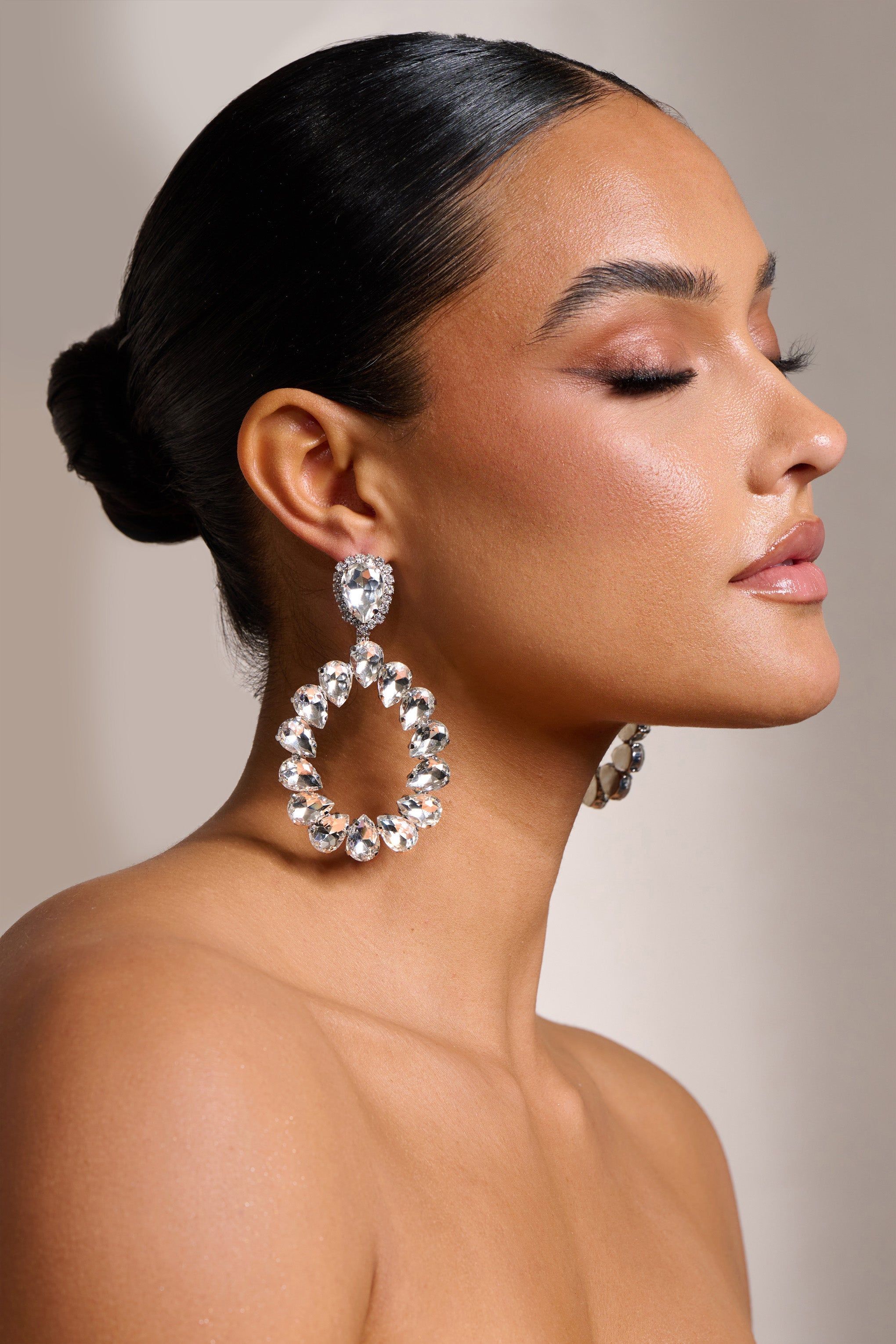 Shania | Silver Diamante Teardrop Earrings sold by Club L London
