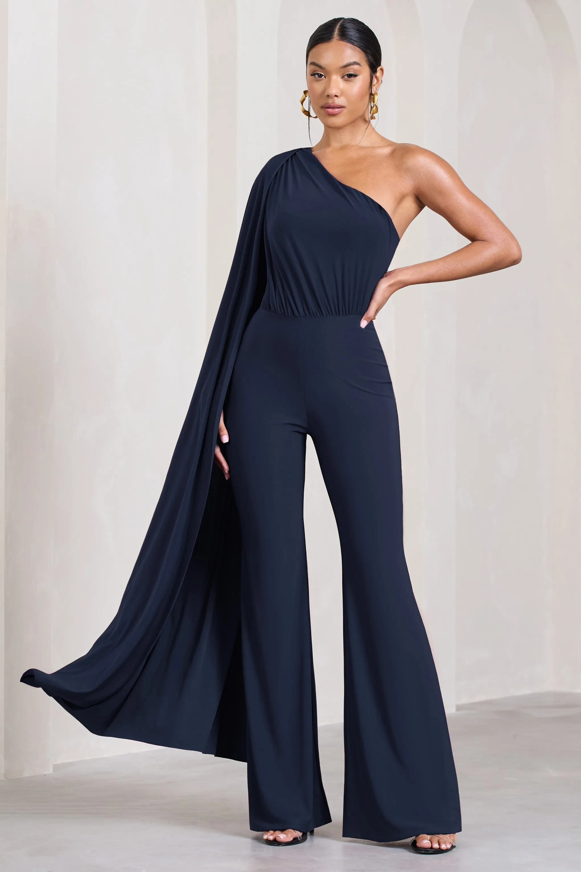 Aurora | Navy One Shoulder Cape Sleeve Jumpsuit sold by Club L London