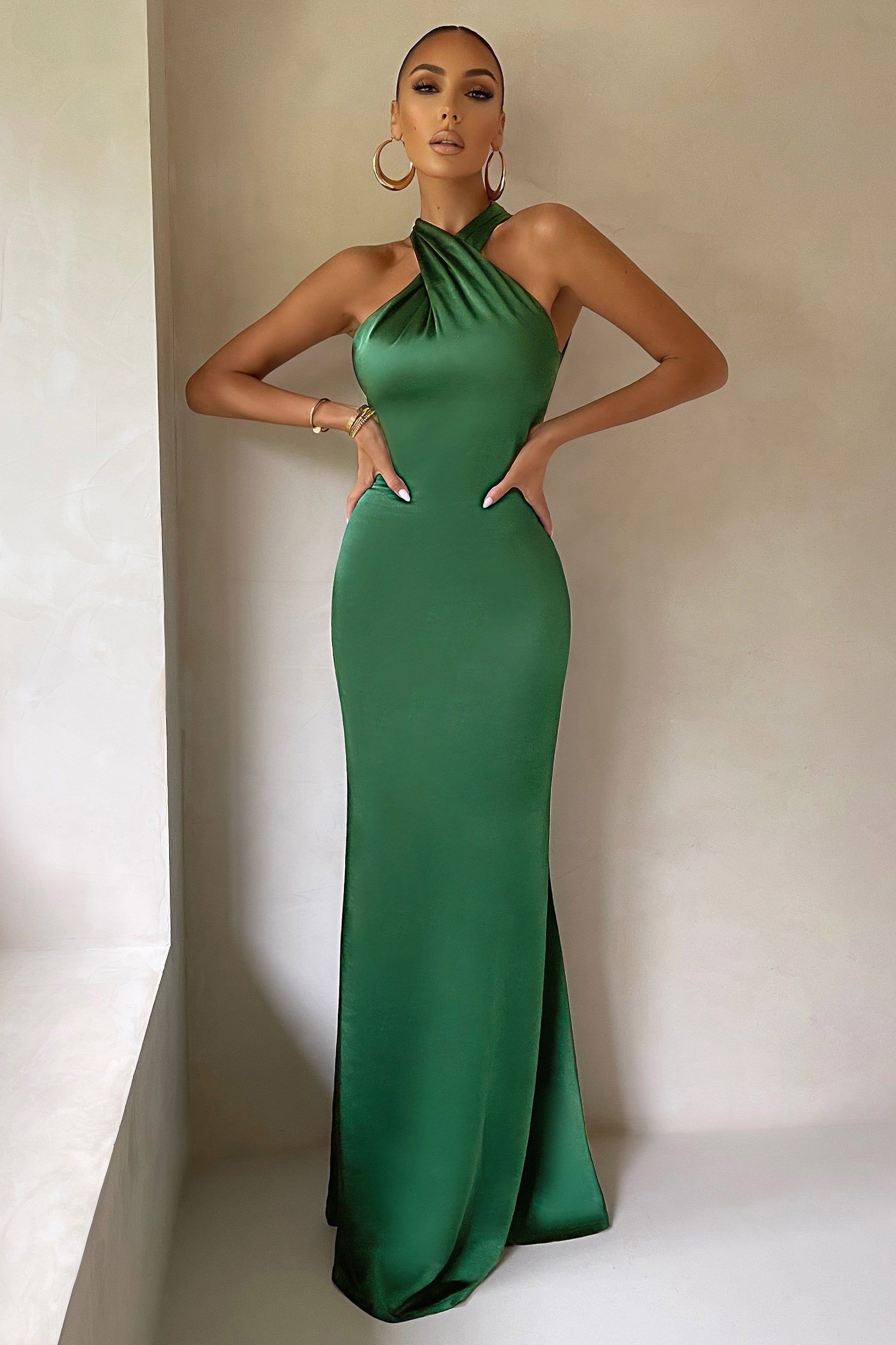 Unstoppable | Emerald Green Cross Over Halter Neck Maxi Dress sold by Club L London