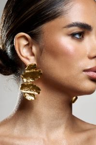 Sierra Madre | Gold Textured Abstract Drop Earrings sold by Club L London