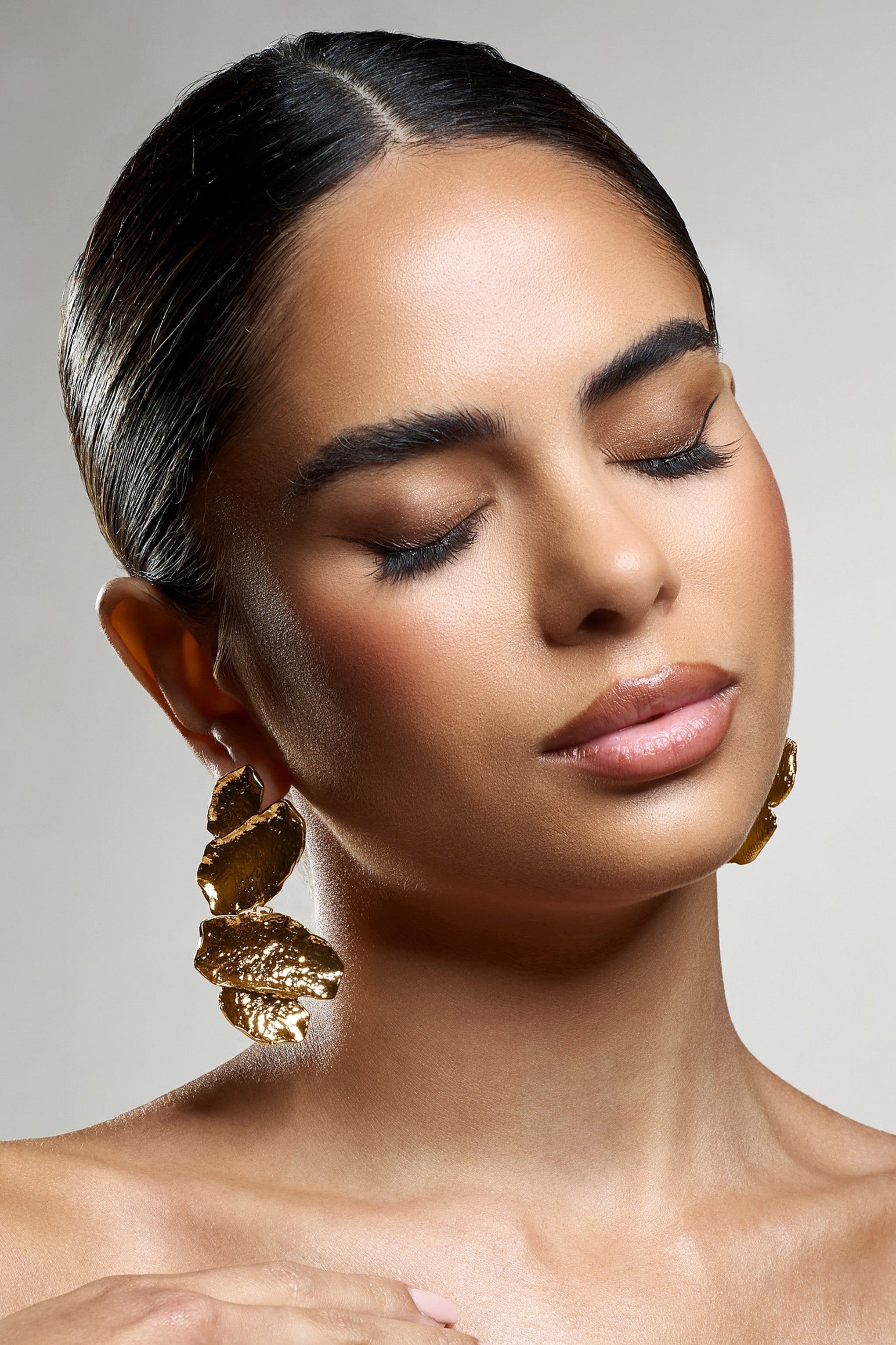 Sierra Madre | Gold Textured Abstract Drop Earrings sold by Club L London product image thumbnail 2
